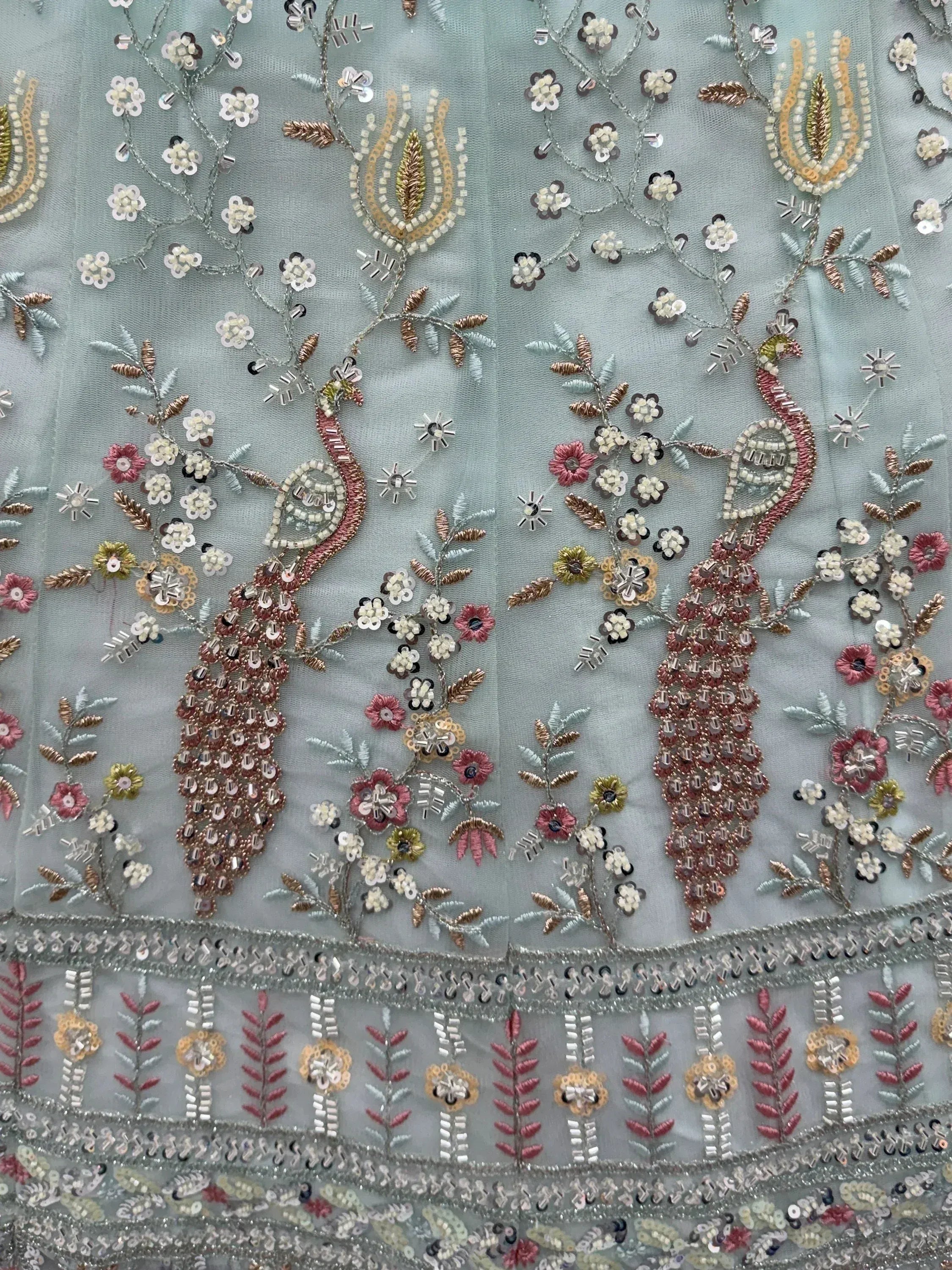 Graceful Sky Blue Embroidered Net Party Wear Lehenga Choli