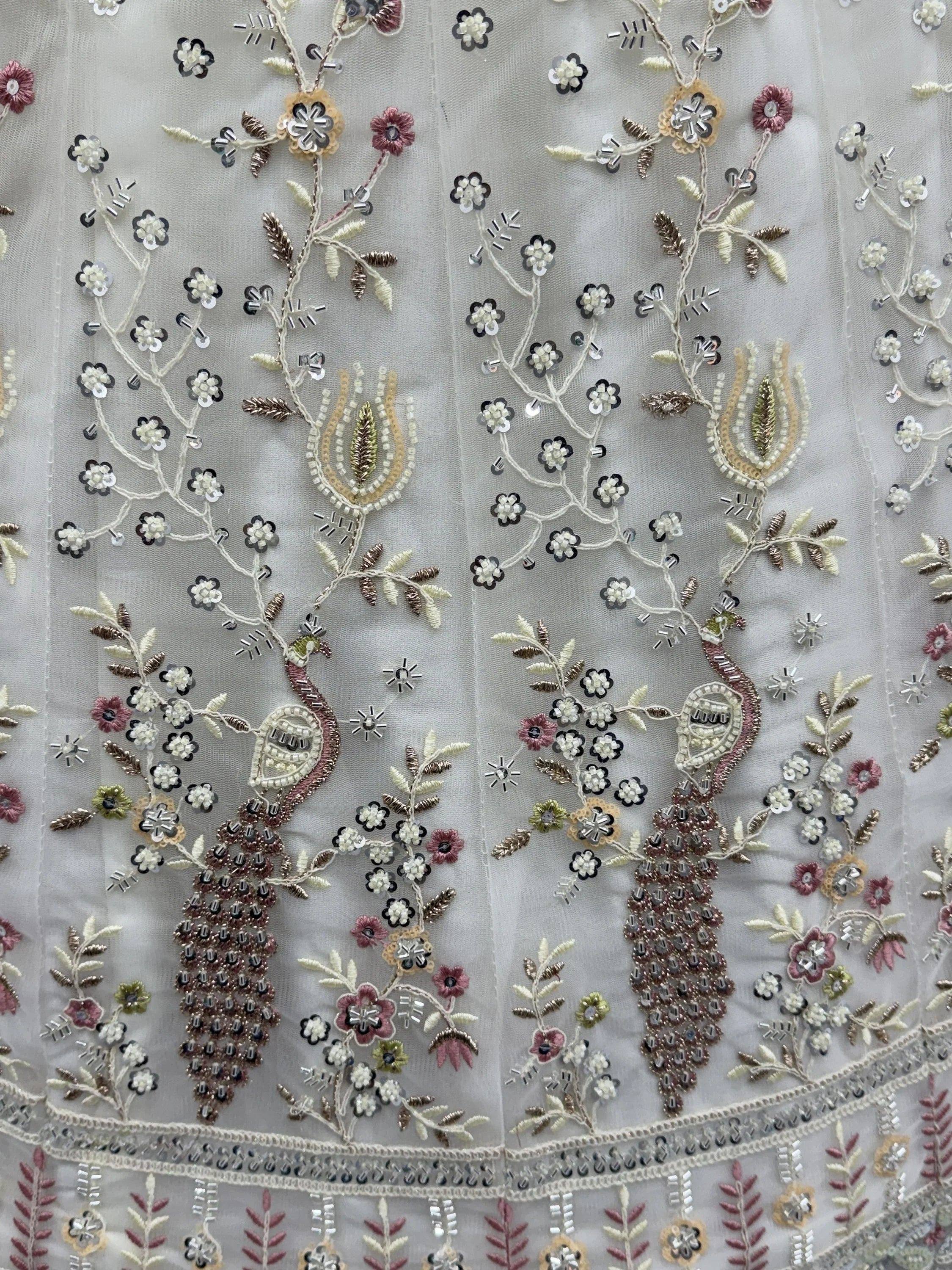 Sparkling Off-White Embroidered Net Bridesmaid Wear Lehenga Choli