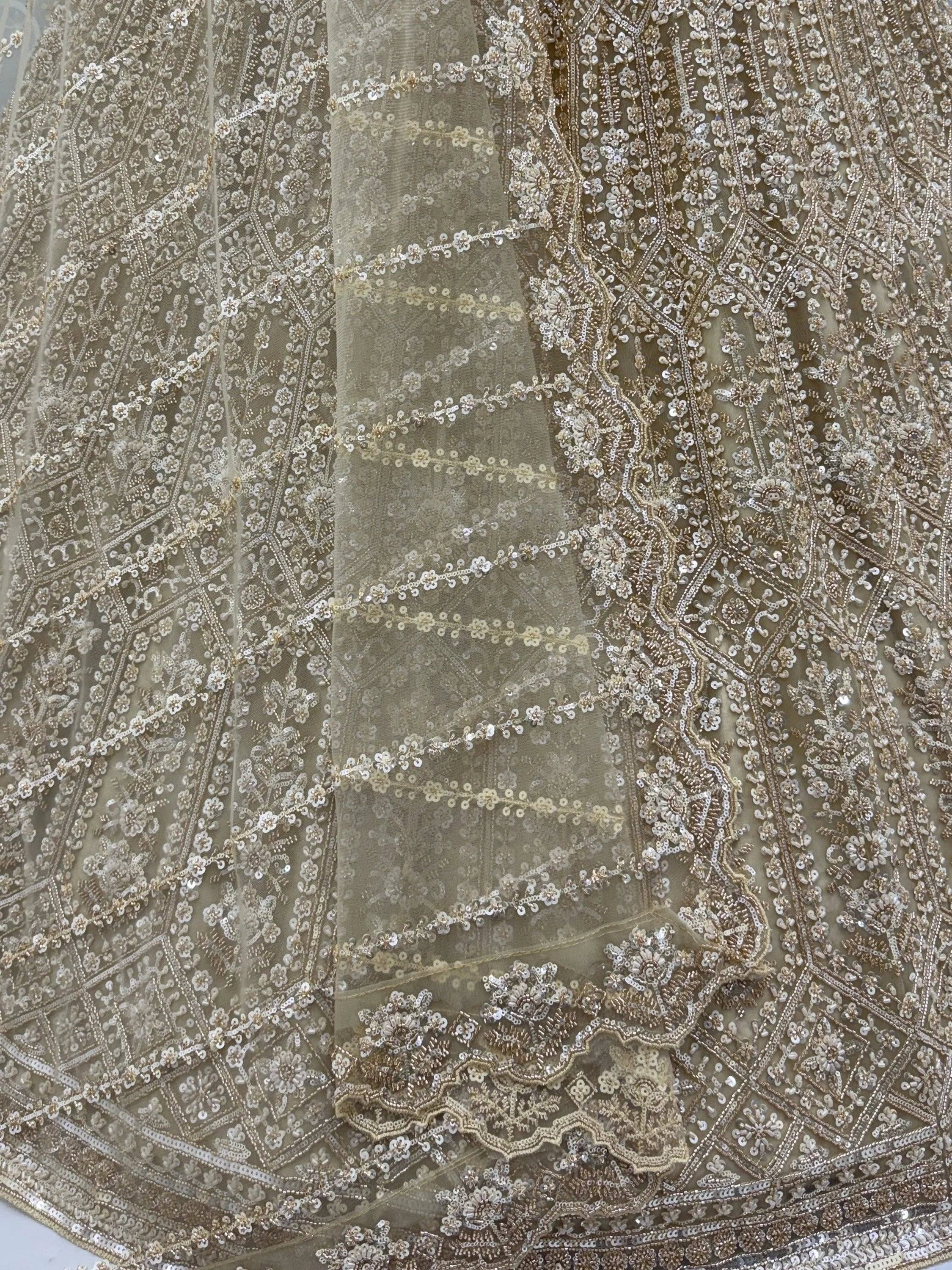 Graceful Golden Hand Work Net Designer Lehenga Choli With Dupatta