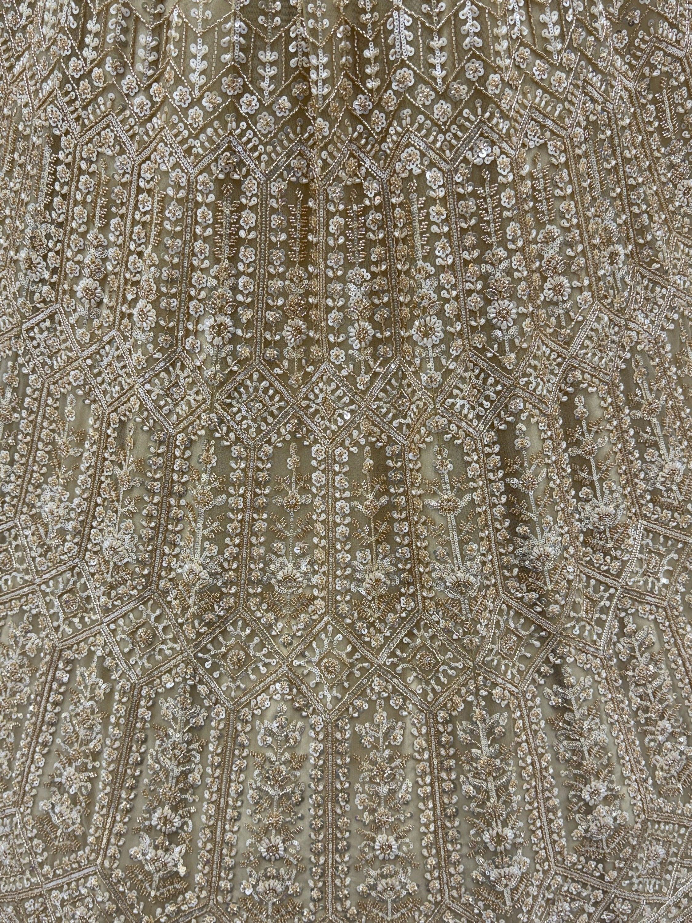Graceful Golden Hand Work Net Designer Lehenga Choli With Dupatta