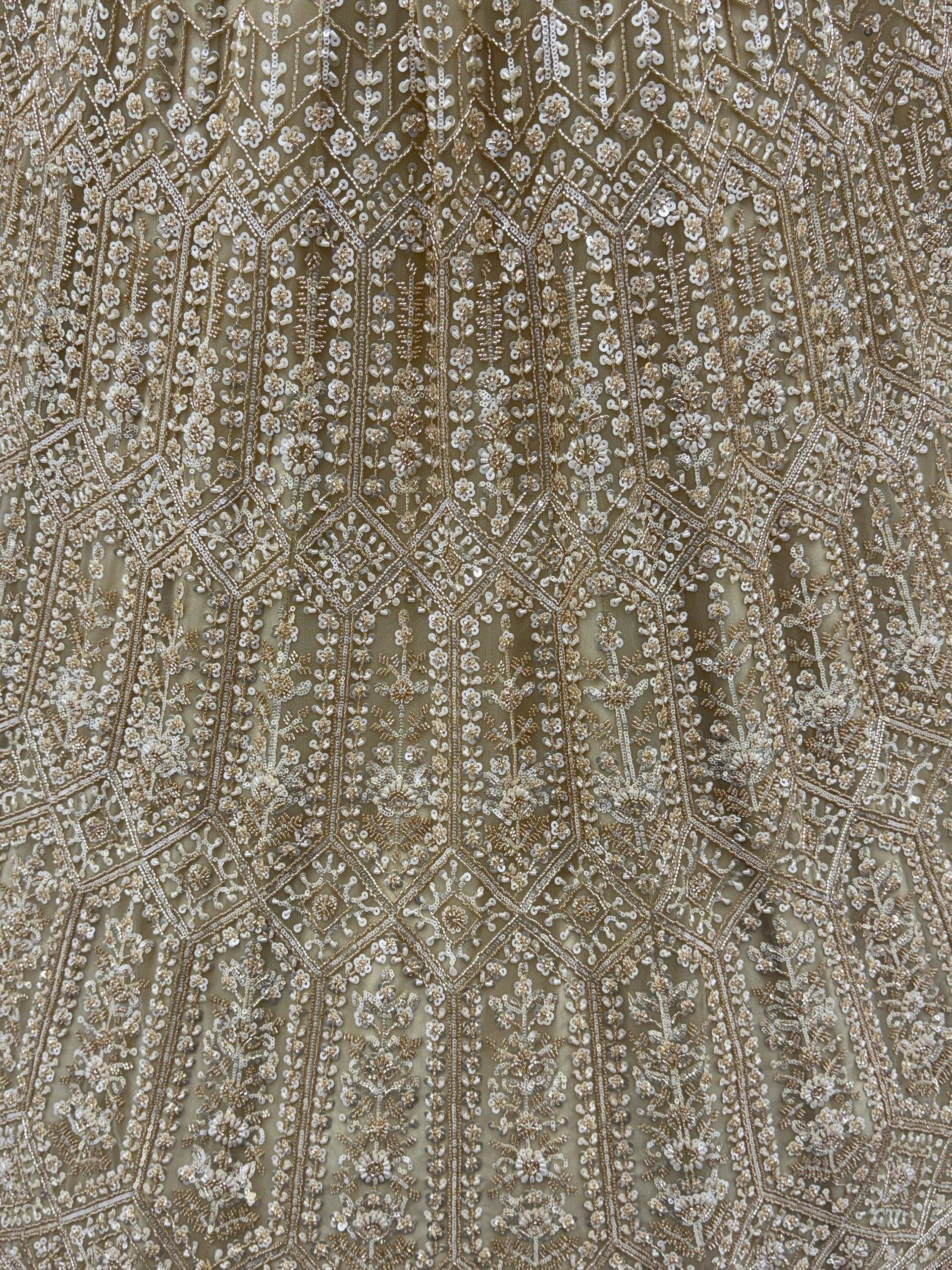 Graceful Golden Hand Work Net Designer Lehenga Choli With Dupatta