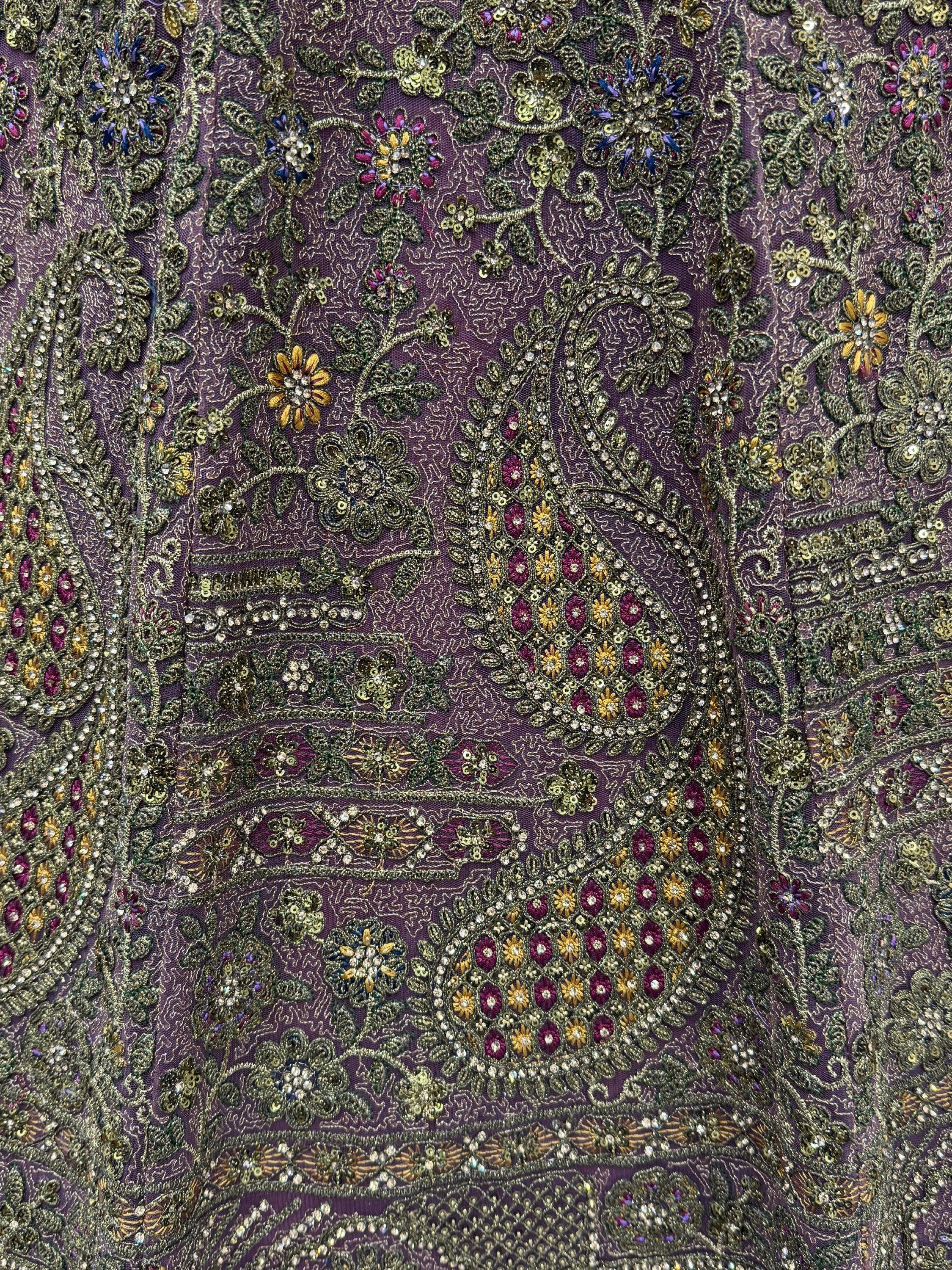 Luxurious Mauve Dori Work Net Reception Wear Lehenga With Blouse