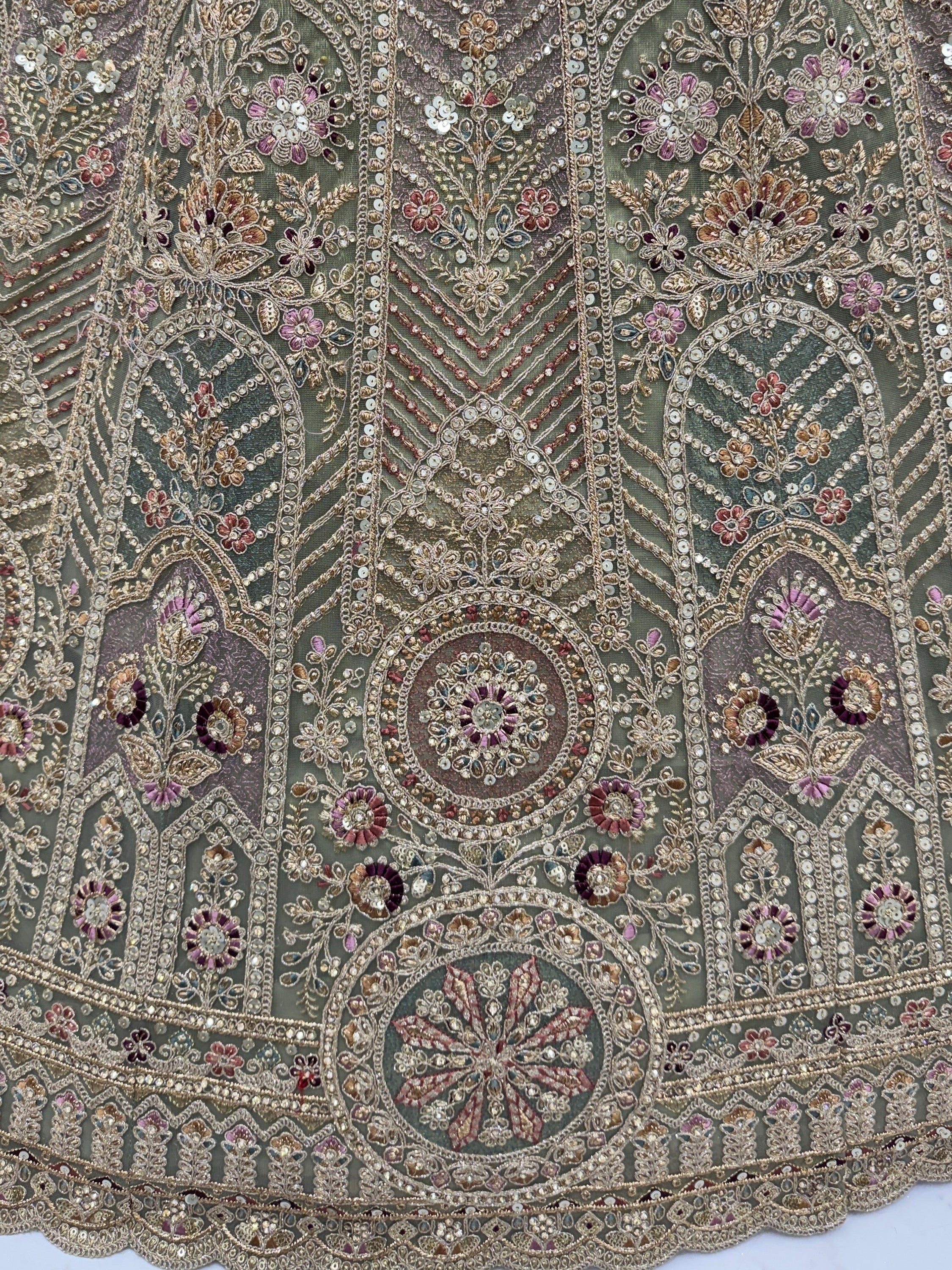 Ravishing Green Heavy Embroidered Net Evening Wear Lehenga Choli