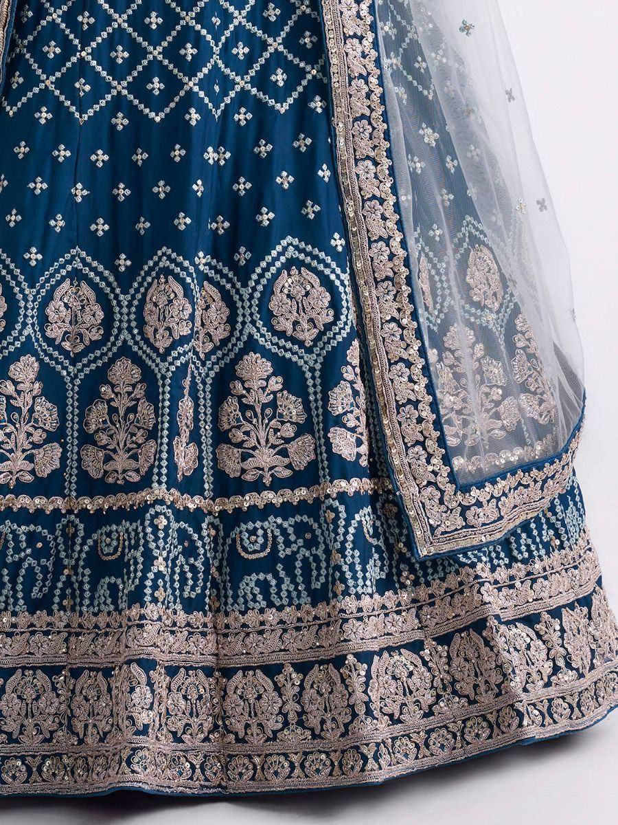Blue embroidered lehenga choli with gold floral motifs and sheer dupatta, Indian ethnic wear