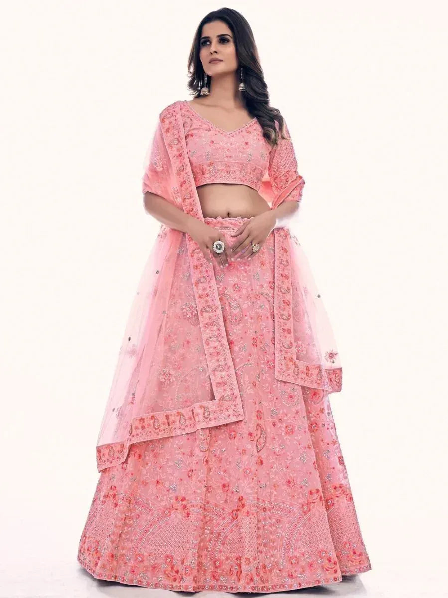 Pink embroidered lehenga choli with floral patterns and sheer dupatta, perfect for Indian ethnic wear occasions