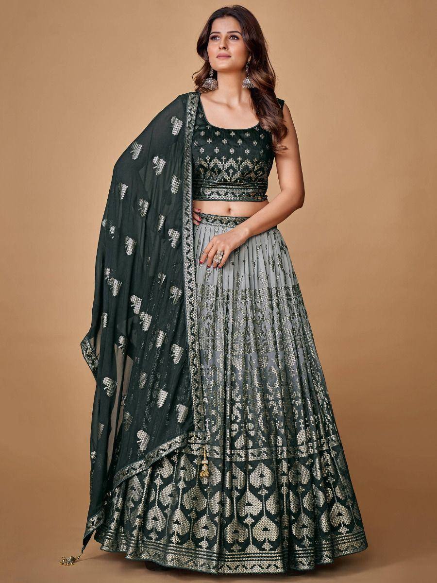 Elegant dark green and silver lehenga choli with intricate embroidery and matching dupatta for Indian ethnic wear