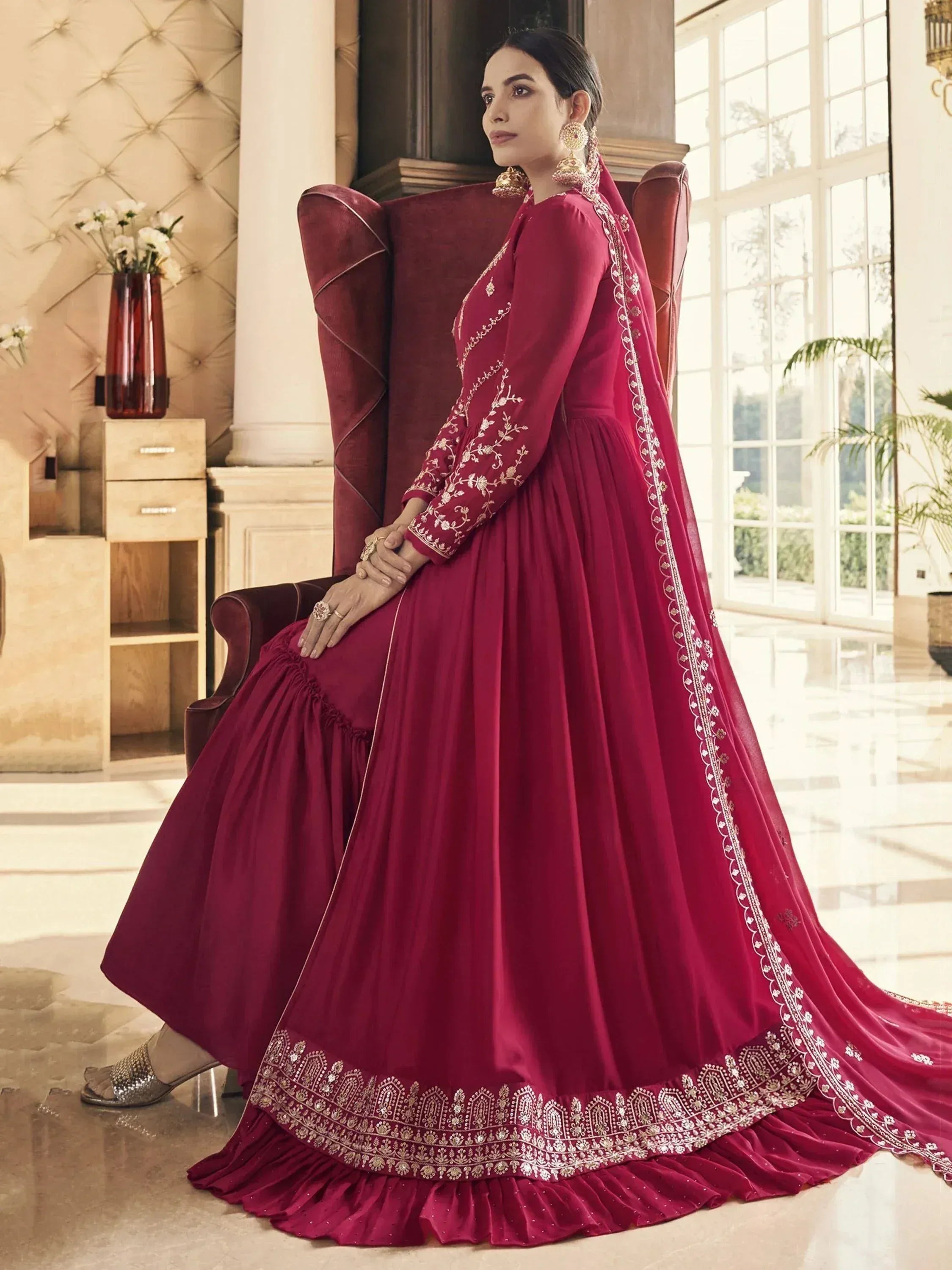 Elegant maroon anarkali gown with gold embroidery, perfect for Indian ethnic wear and festive occasions.