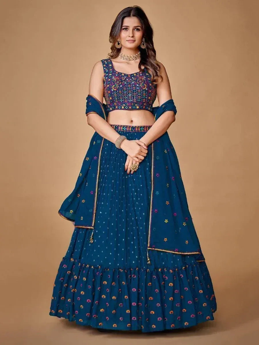 Blue embroidered lehenga choli with floral patterns, perfect for Indian ethnic wear occasions