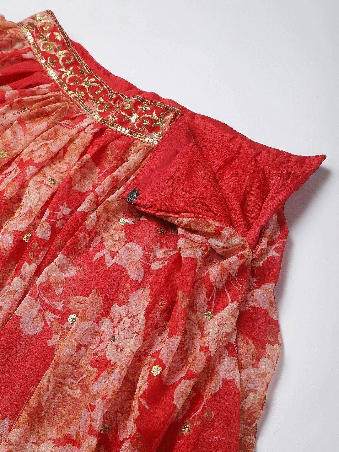 Red floral ethnic gown with gold embroidery and sequin detailing, perfect for festive occasions.
