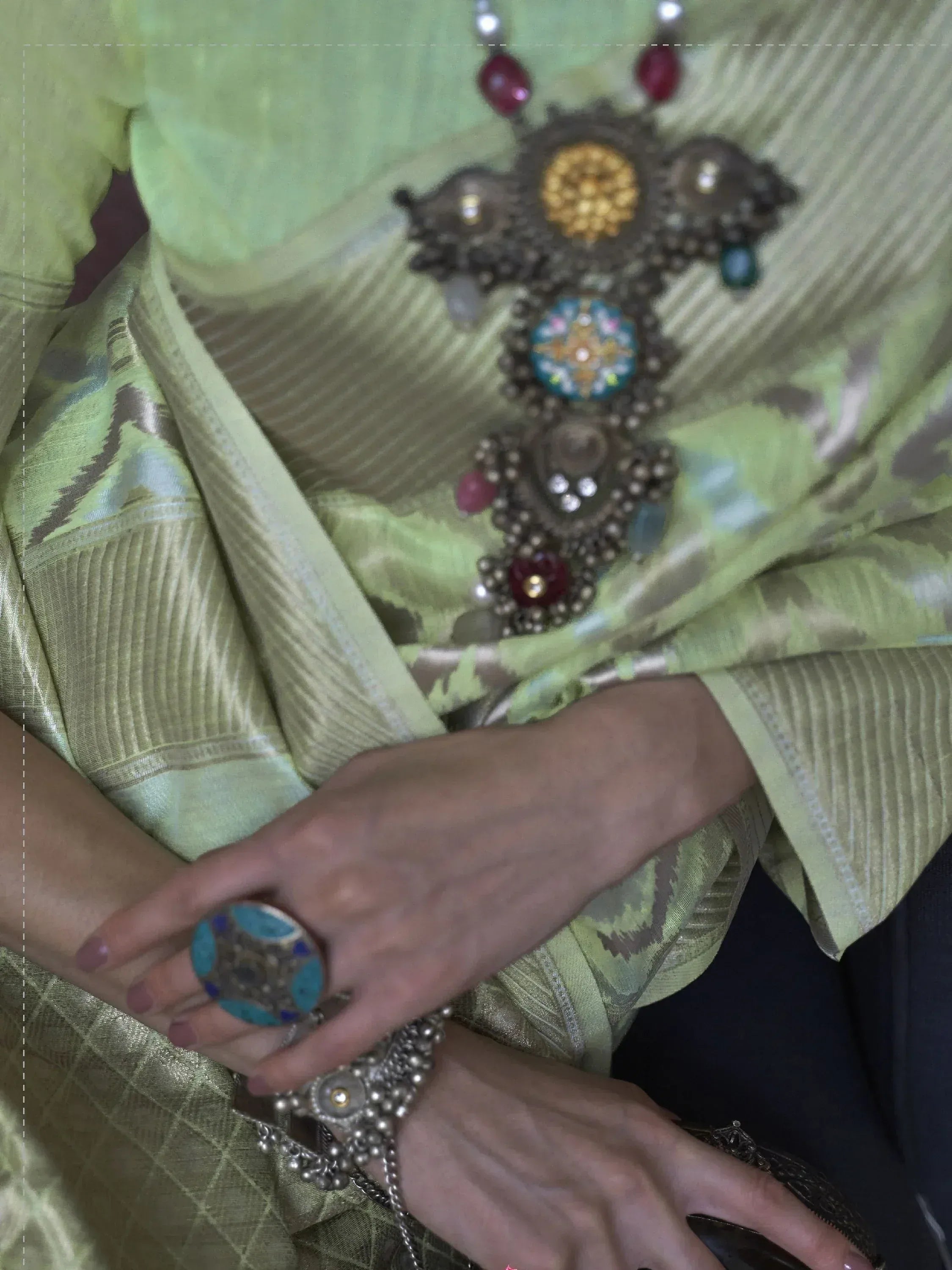 Elegant green ethnic saree with intricate jewelry, perfect for Indian festive occasions and traditional events.
