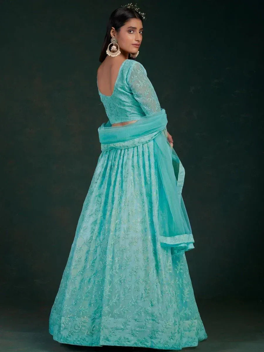 Turquoise designer lehenga choli with floral embroidery, perfect for Indian ethnic wear occasions