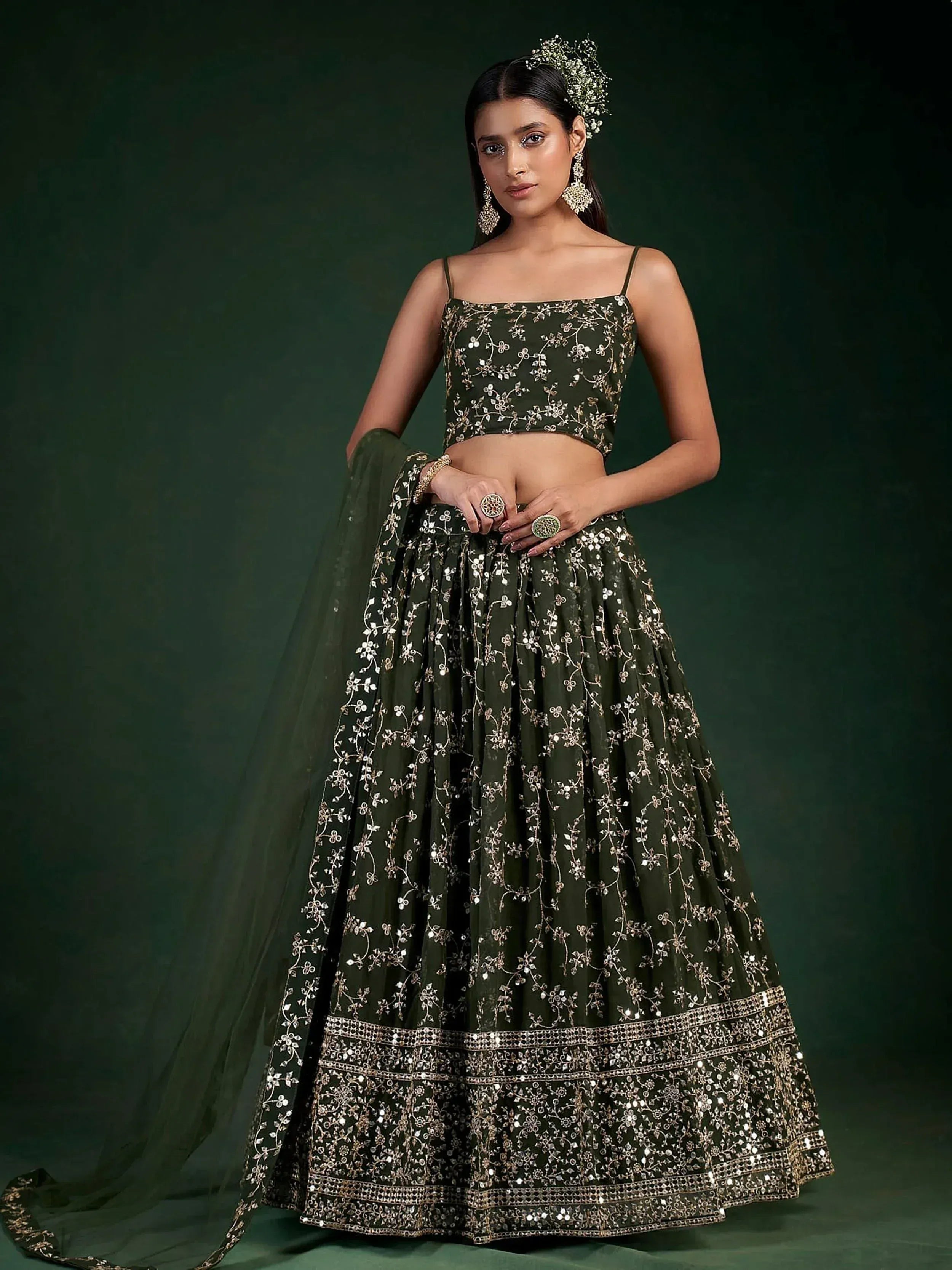Olive green embroidered lehenga choli with floral motifs and mirror work, perfect for Indian ethnic occasions.
