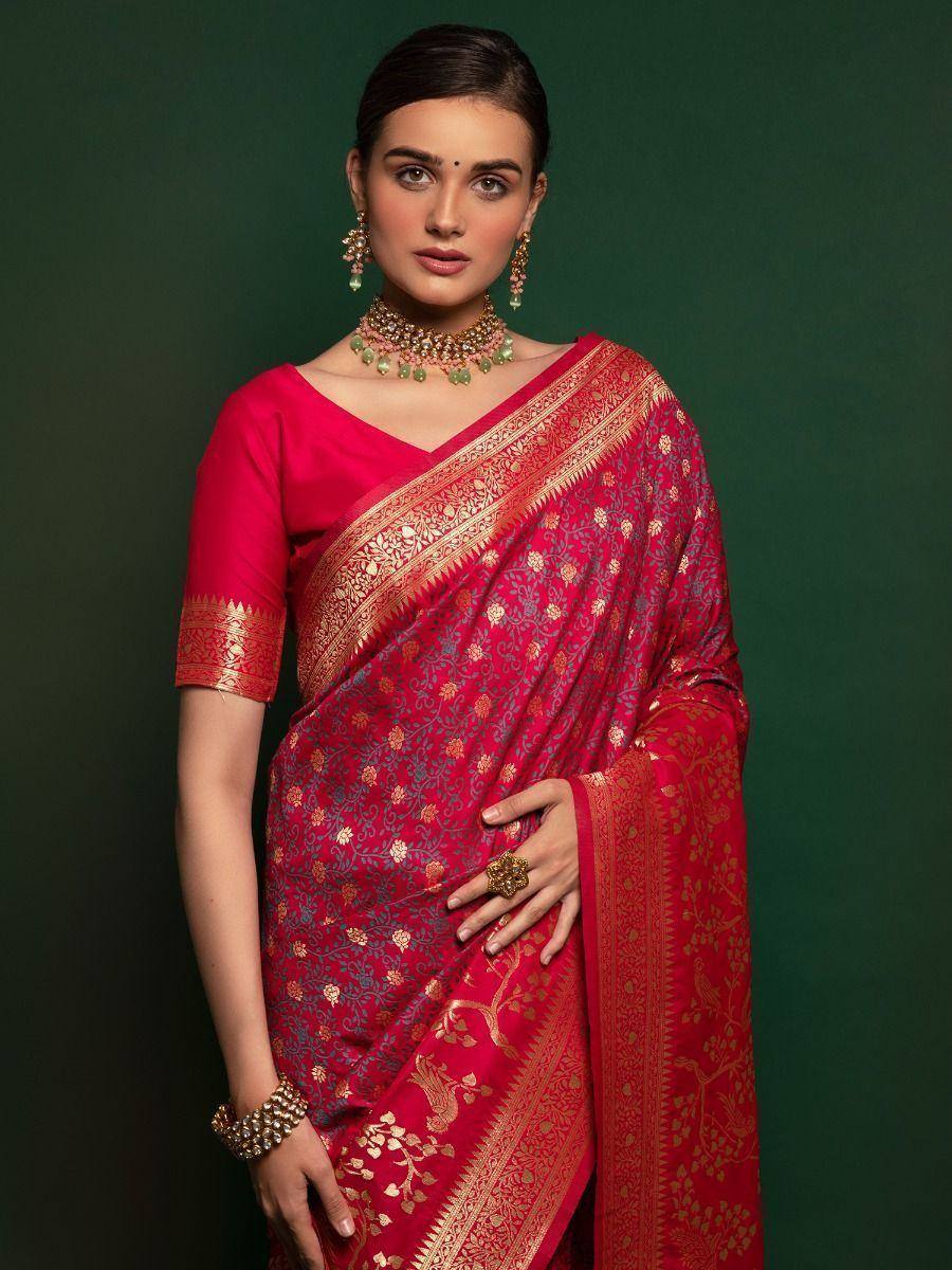 Red designer saree with gold floral embroidery and matching blouse, perfect for Indian ethnic occasions