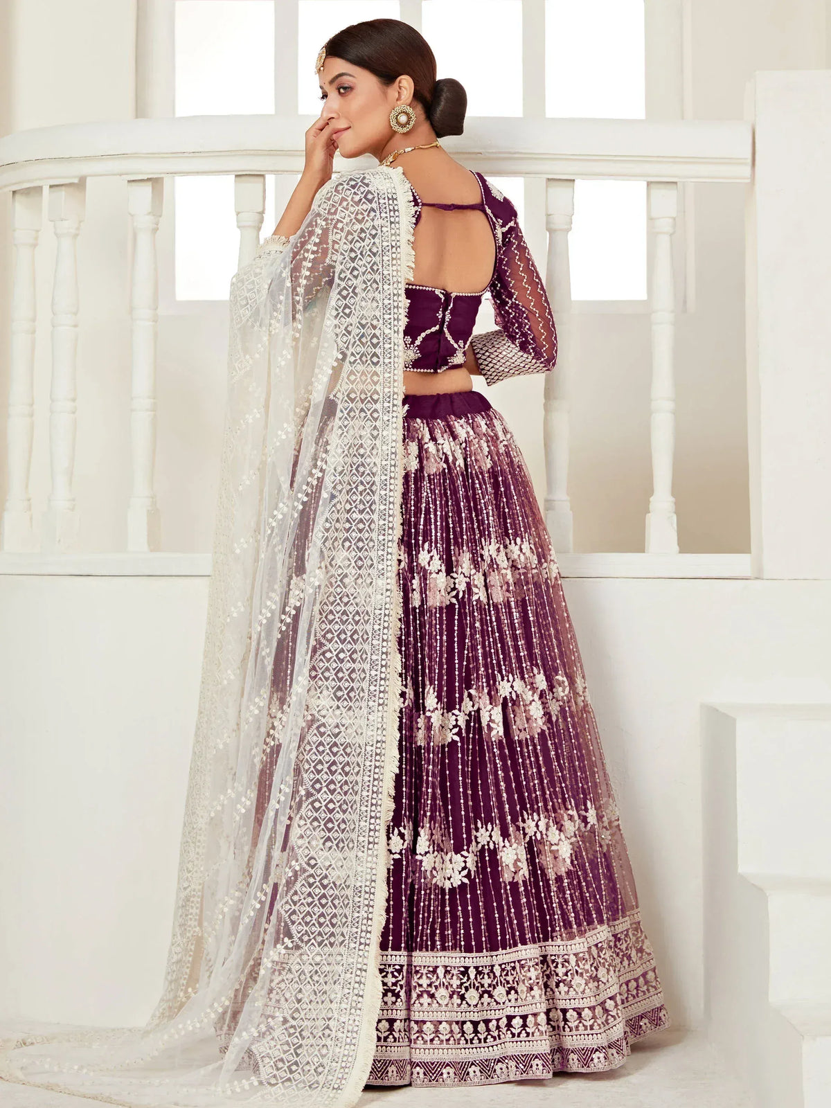 Purple embroidered lehenga choli with white dupatta, ethnic Indian wedding wear
