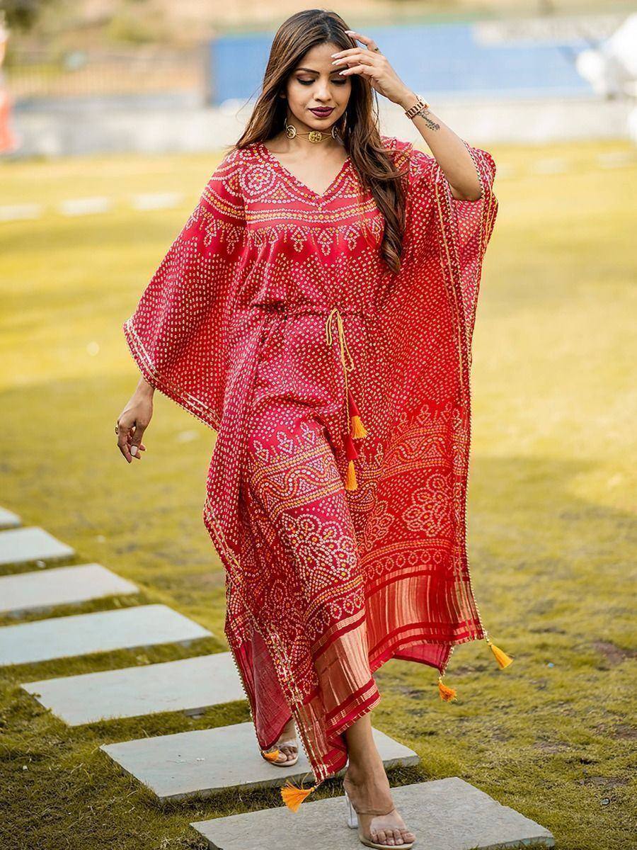 Red printed ethnic kaftan gown with tassels, perfect for Indian occasions and festive wear