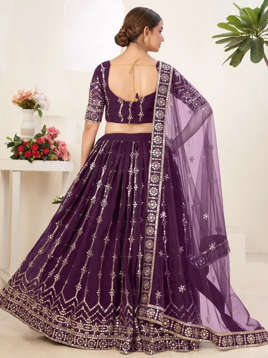 Purple designer lehenga choli with gold mirror work and sheer dupatta, ethnic Indian wear