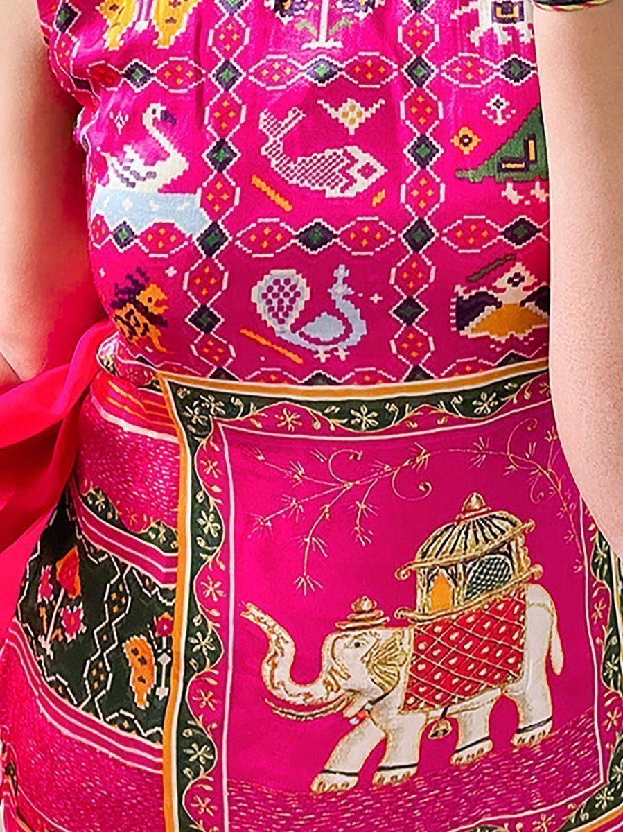 Vibrant pink ethnic gown with elephant & bird motifs, perfect for Indian festive occasions