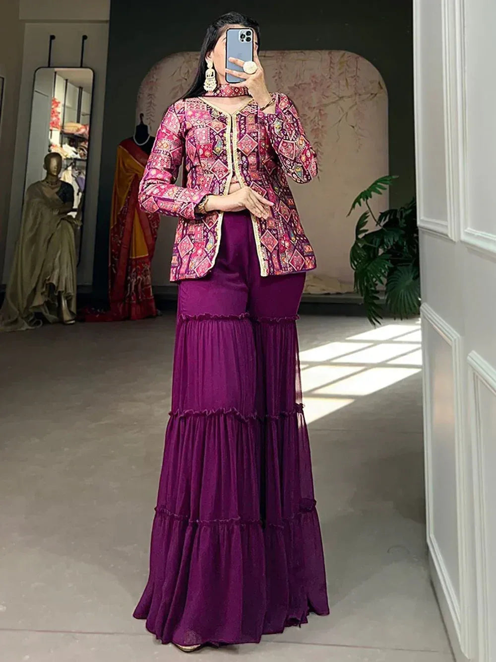 Woman in purple tiered palazzo pants with printed ethnic jacket, perfect for Indian festive wear