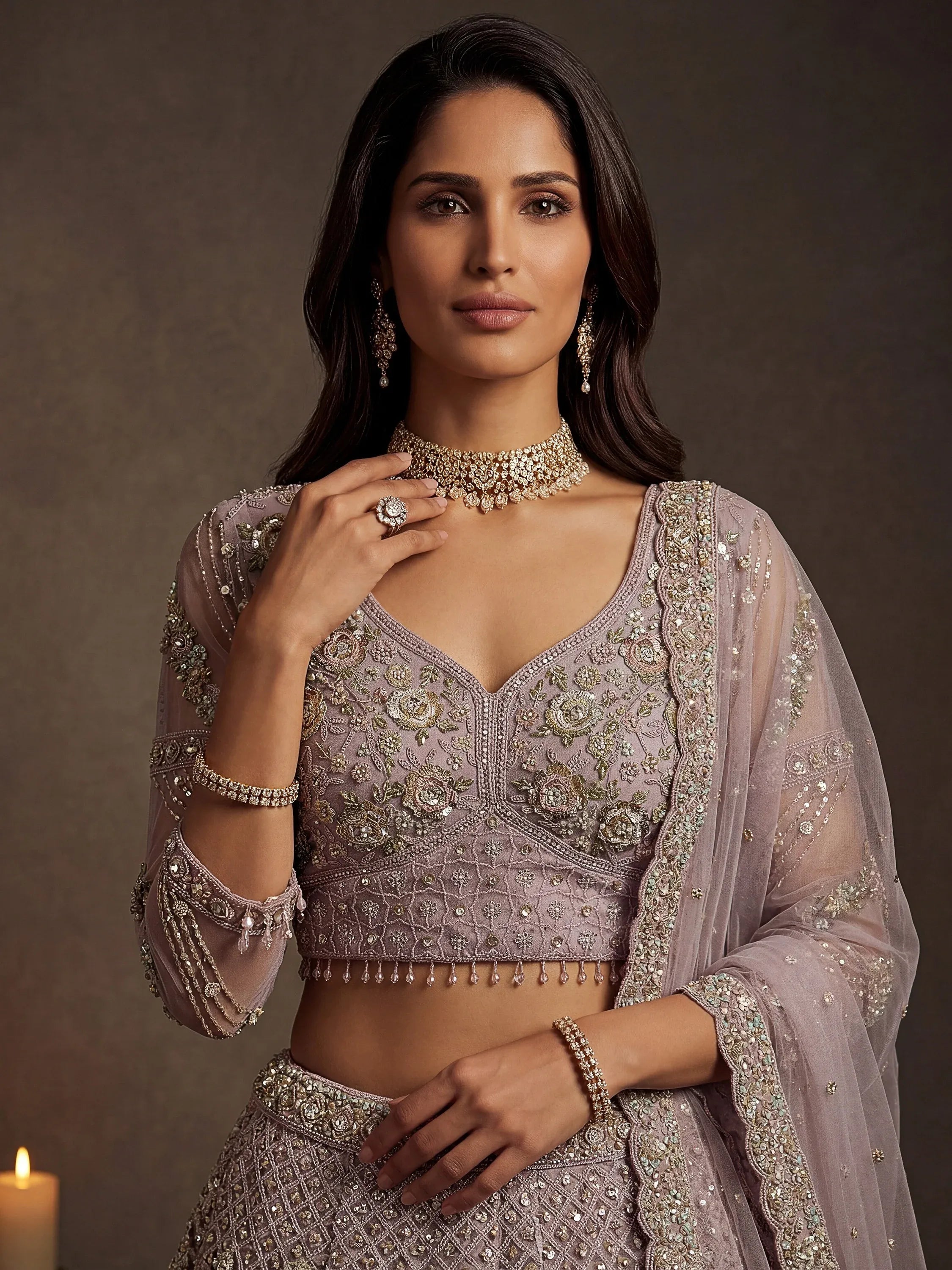 Notable Mauve Multi Thread Work Net Reception Wear Lehenga With Blouse