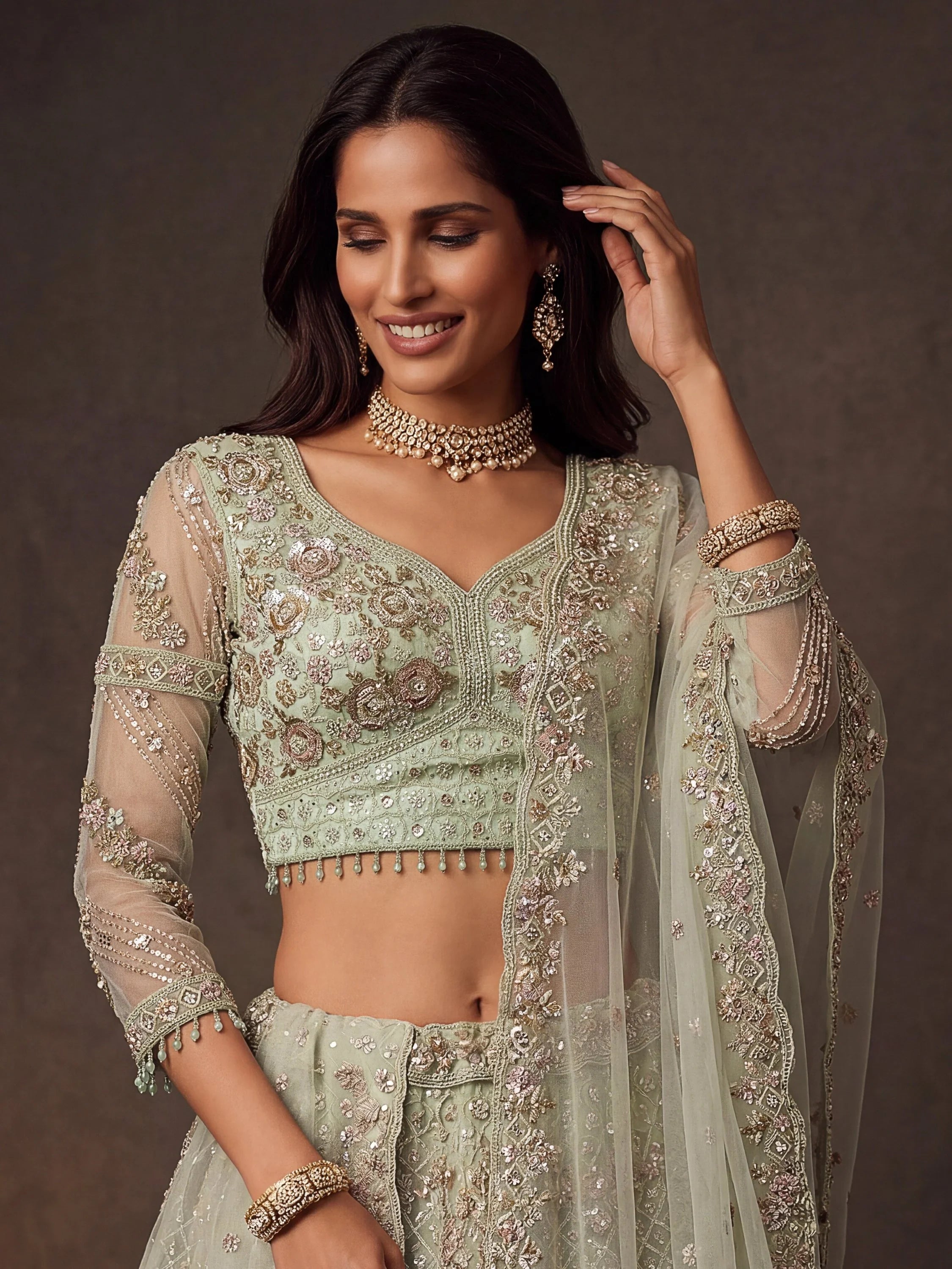 Beautiful Pastel Green Sequins Net Bridesmaid Lehenga Choli