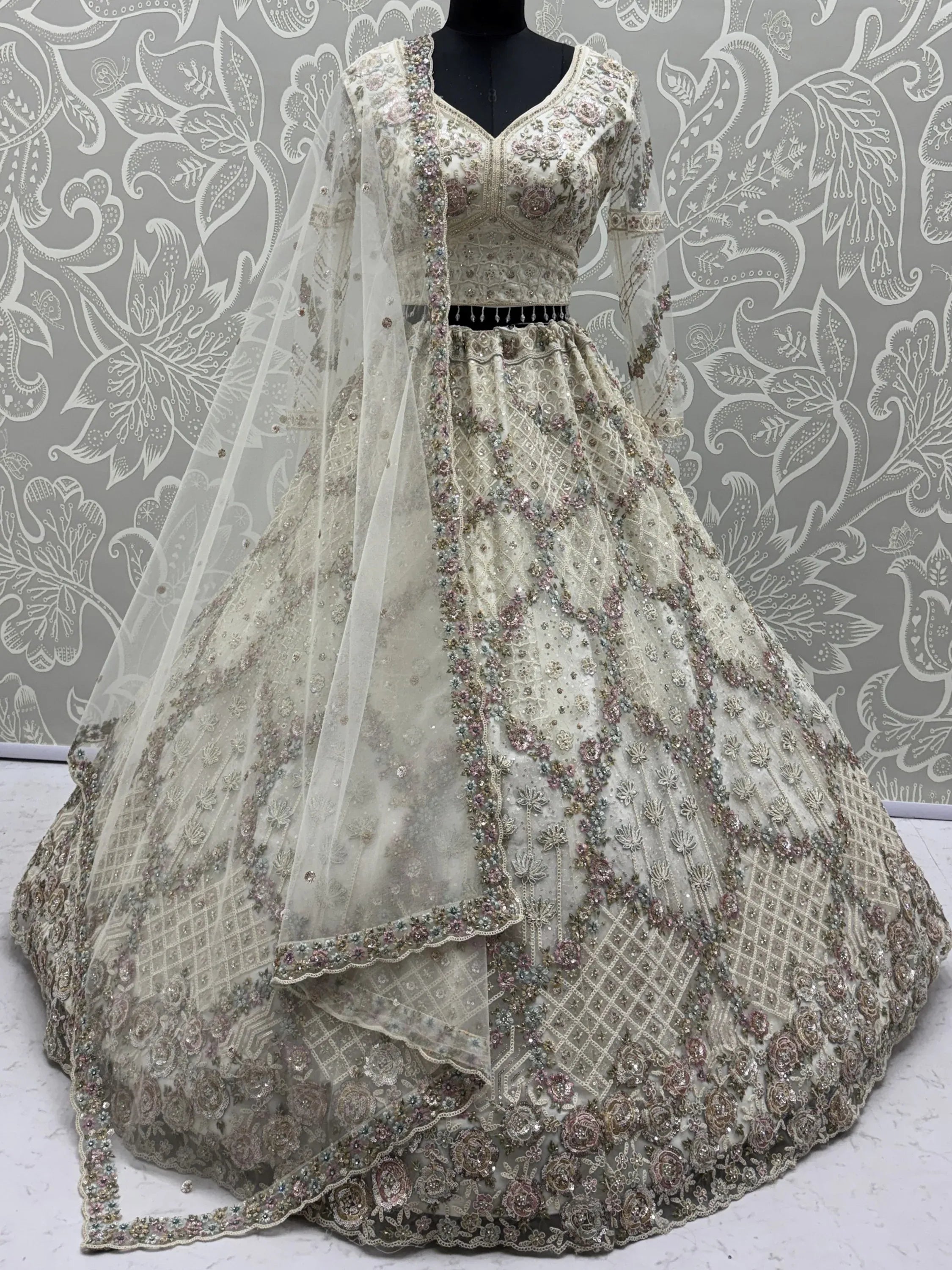Grand White Heavy Embroidered Net Cocktail Wear Lehenga Choli With Dupatta