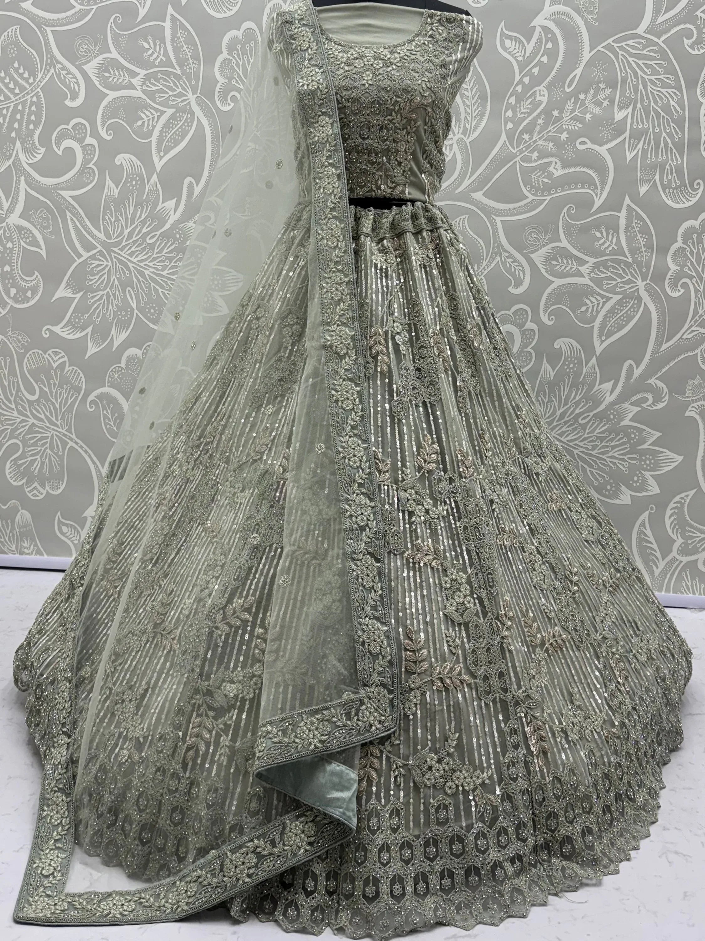 Lavish Green Dori Embroidered Net Wedding Wear Lehenga Choli
