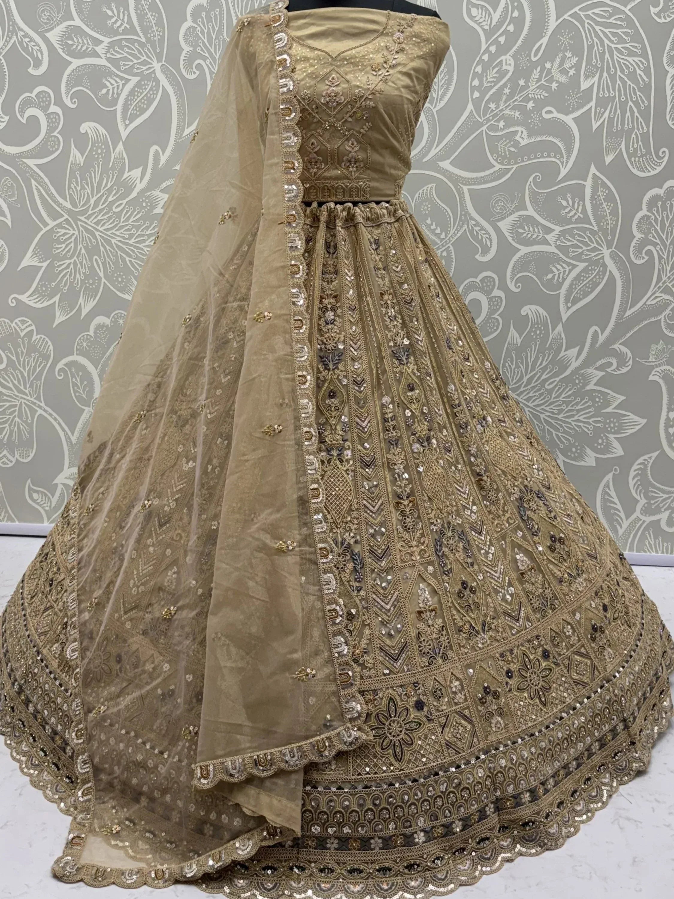 Shiny Beige Embroidered Net Reception Wear Lehenga Choli With Dupatta