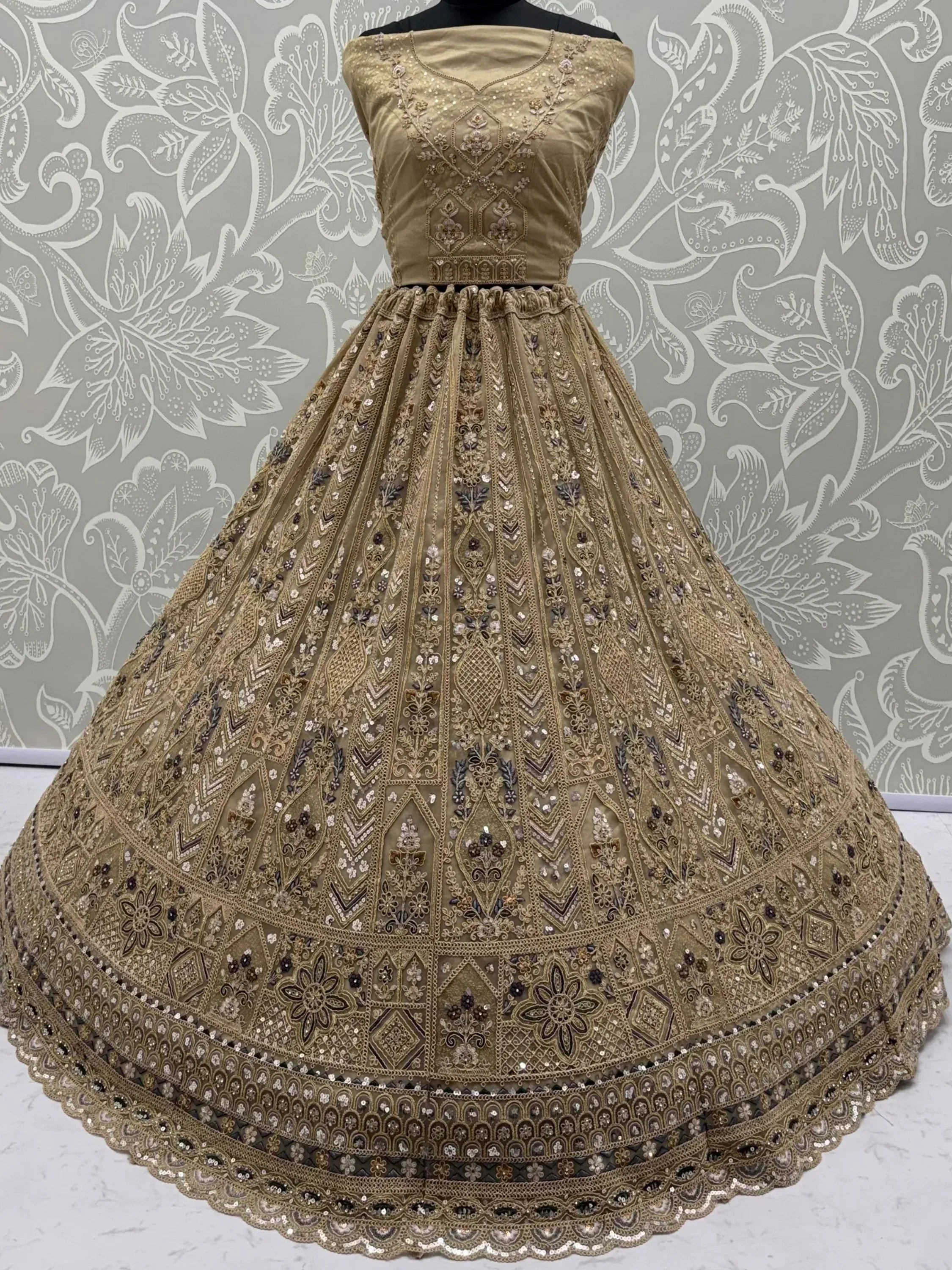 Shiny Beige Embroidered Net Reception Wear Lehenga Choli With Dupatta