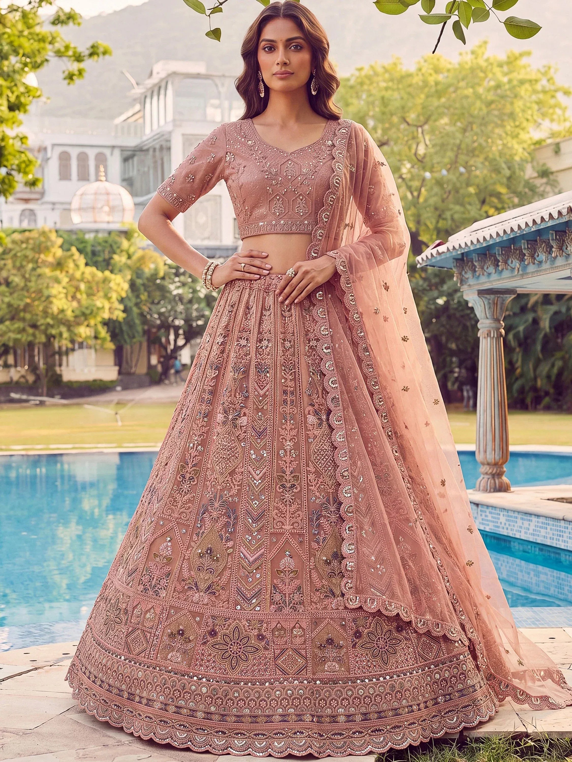 Glowing Peach Embroidered Net Wedding Wear Lehenga Choli with Dupatta