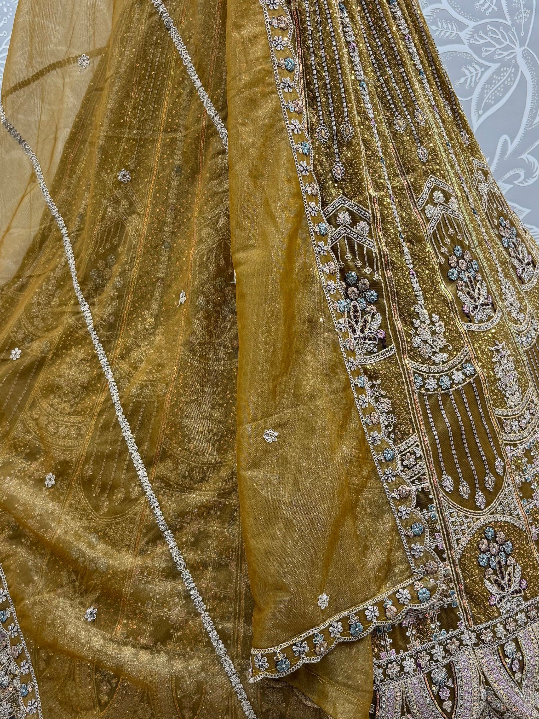 Dazzling Golden Multi Thread Work Net Reception Wear Lehenga Choli