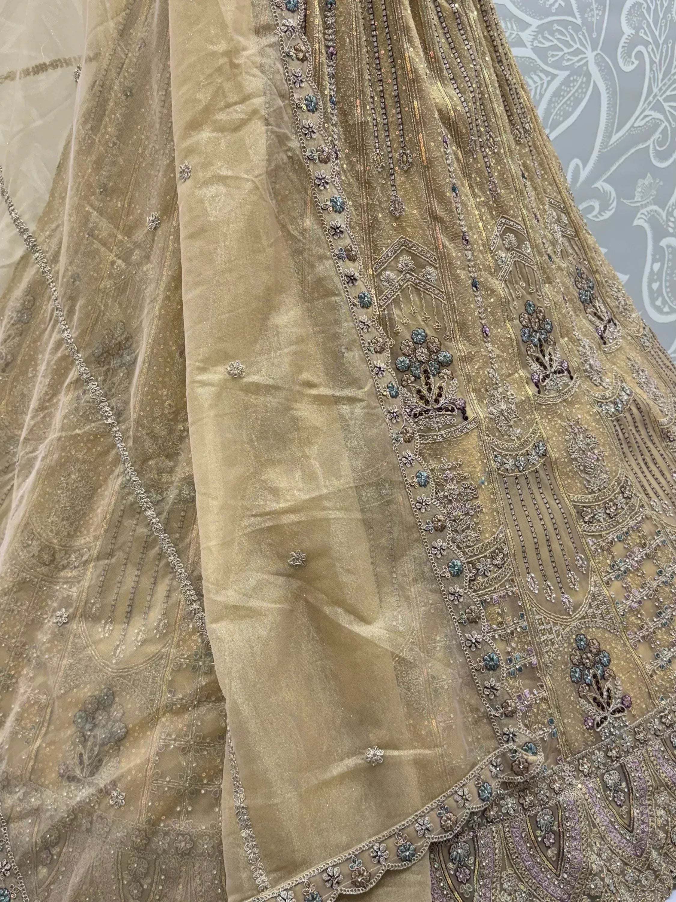 Royal Beige Zari Work Net Wedding Wear Lehenga Choli With Dupatta