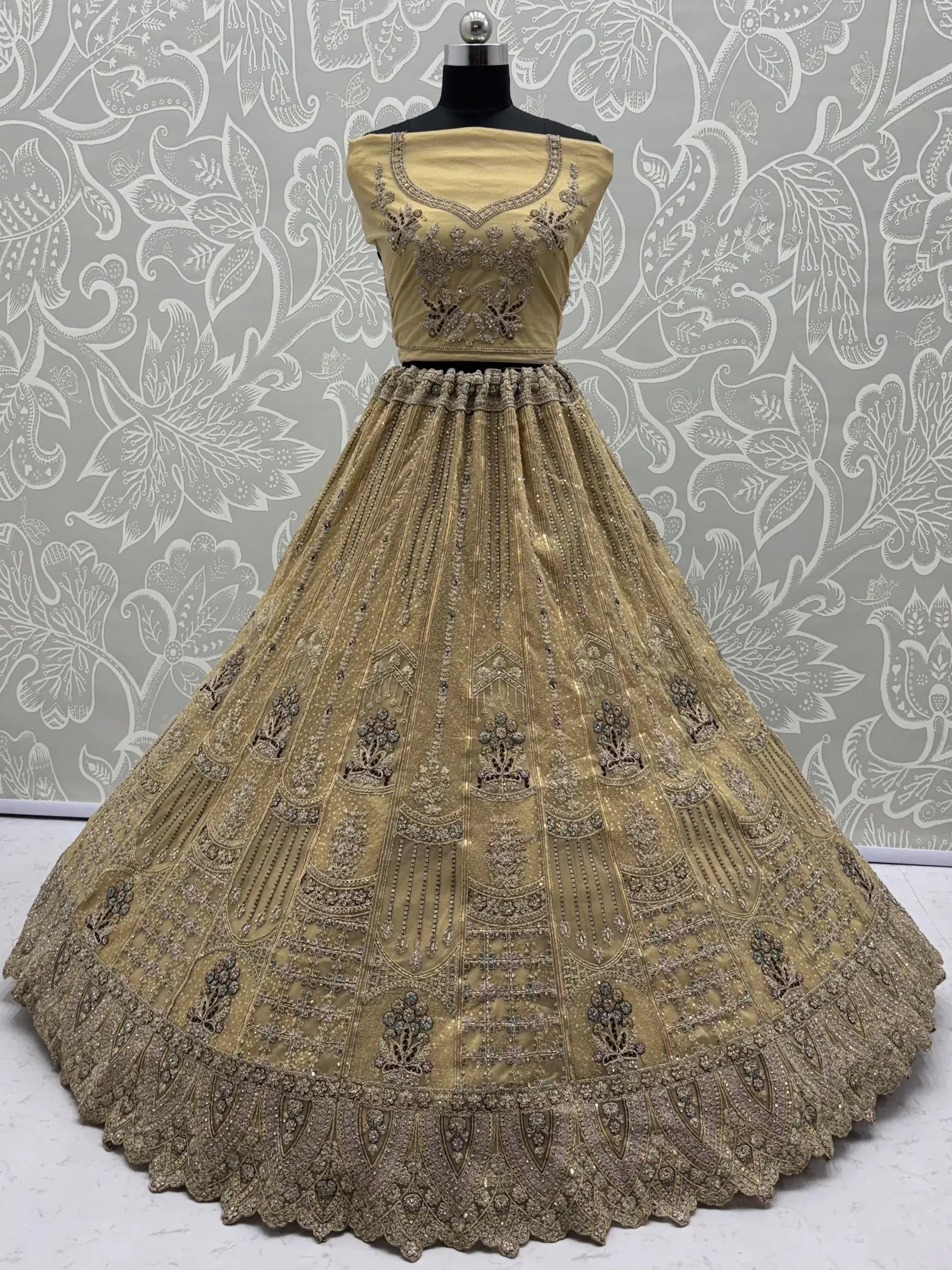 Royal Beige Zari Work Net Wedding Wear Lehenga Choli With Dupatta