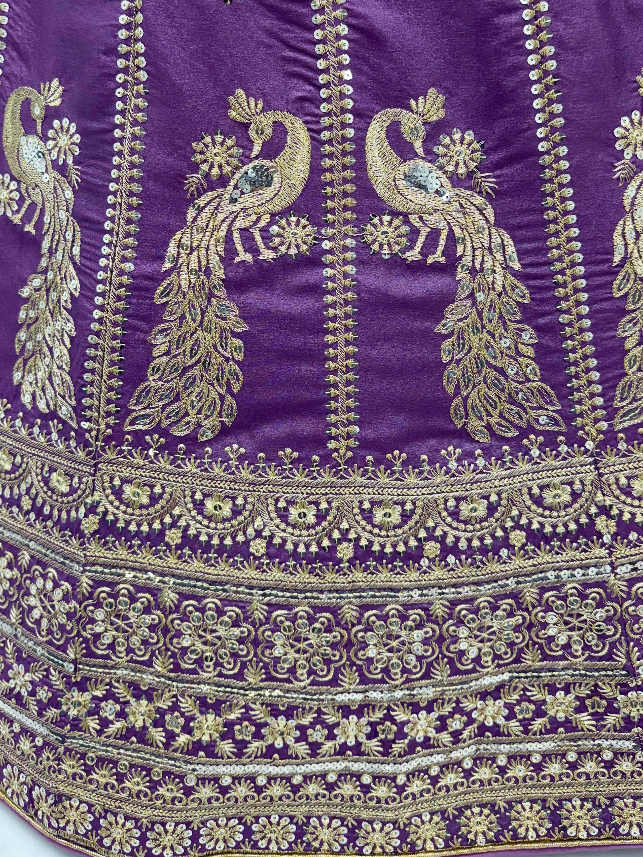 Wondrous Purple Embroidered Silk Reception Wear Lehenga Choli
