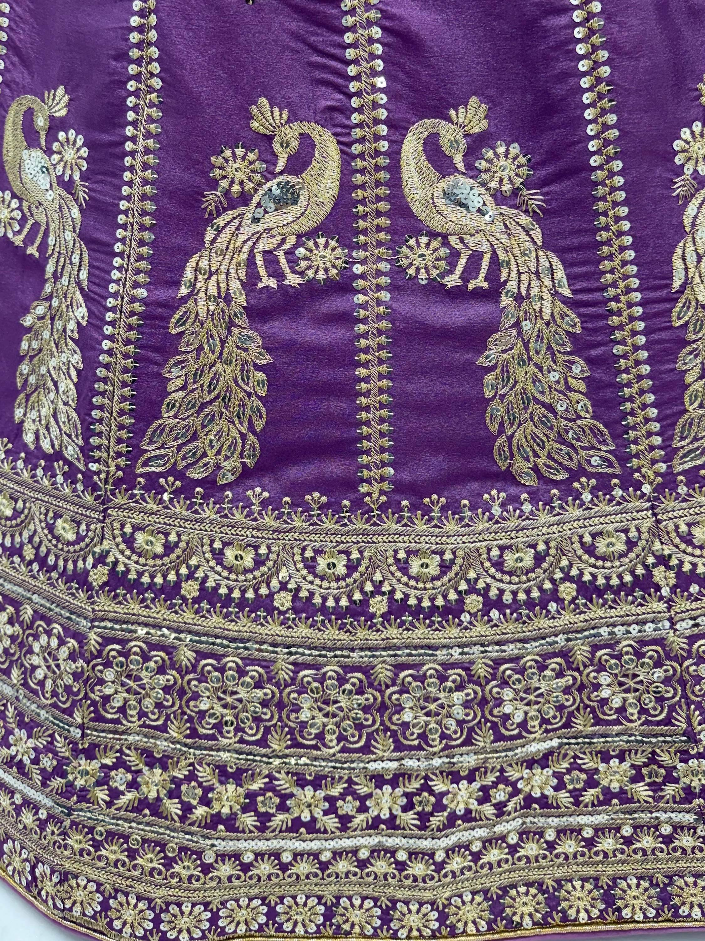 Wondrous Purple Embroidered Silk Reception Wear Lehenga Choli