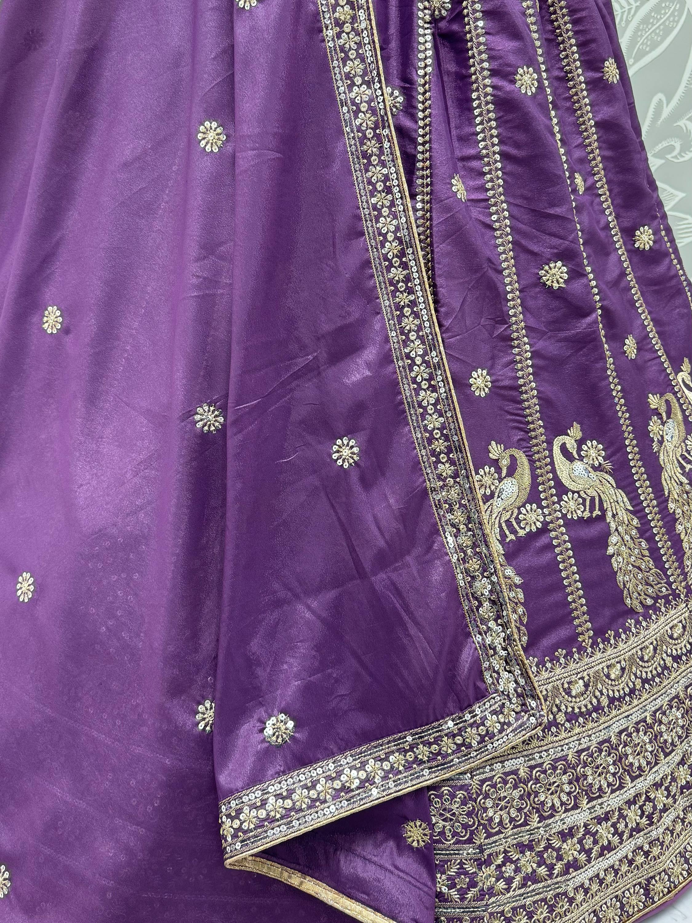 Wondrous Purple Embroidered Silk Reception Wear Lehenga Choli