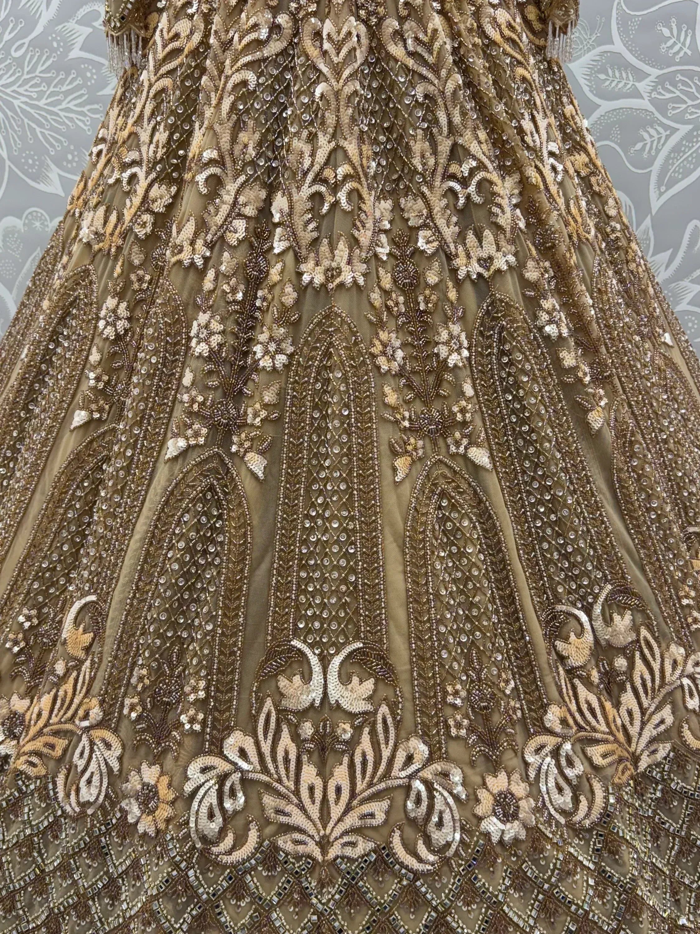 Luxurious Golden Hand Embroidery Net Bridal Lehenga Choli With Dupatta