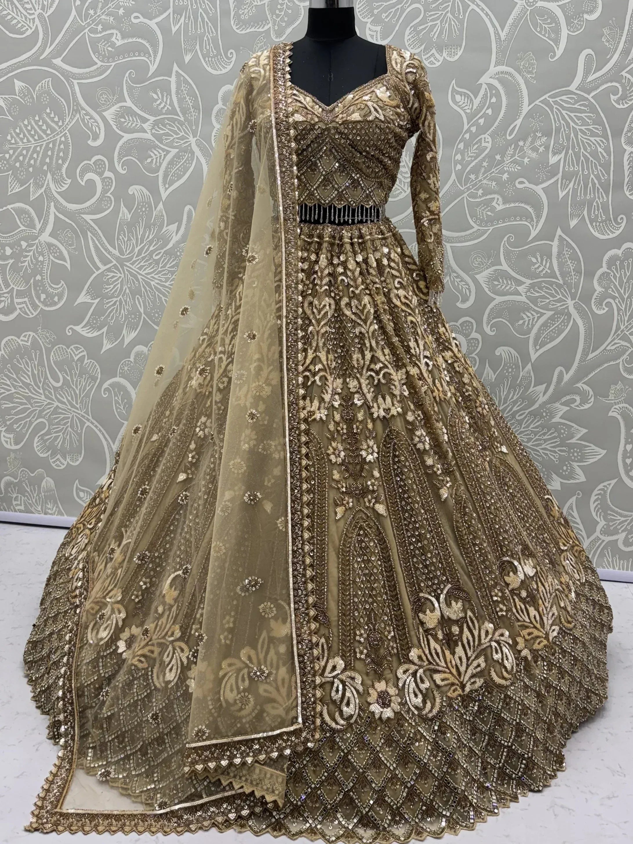 Luxurious Golden Hand Embroidery Net Bridal Lehenga Choli With Dupatta