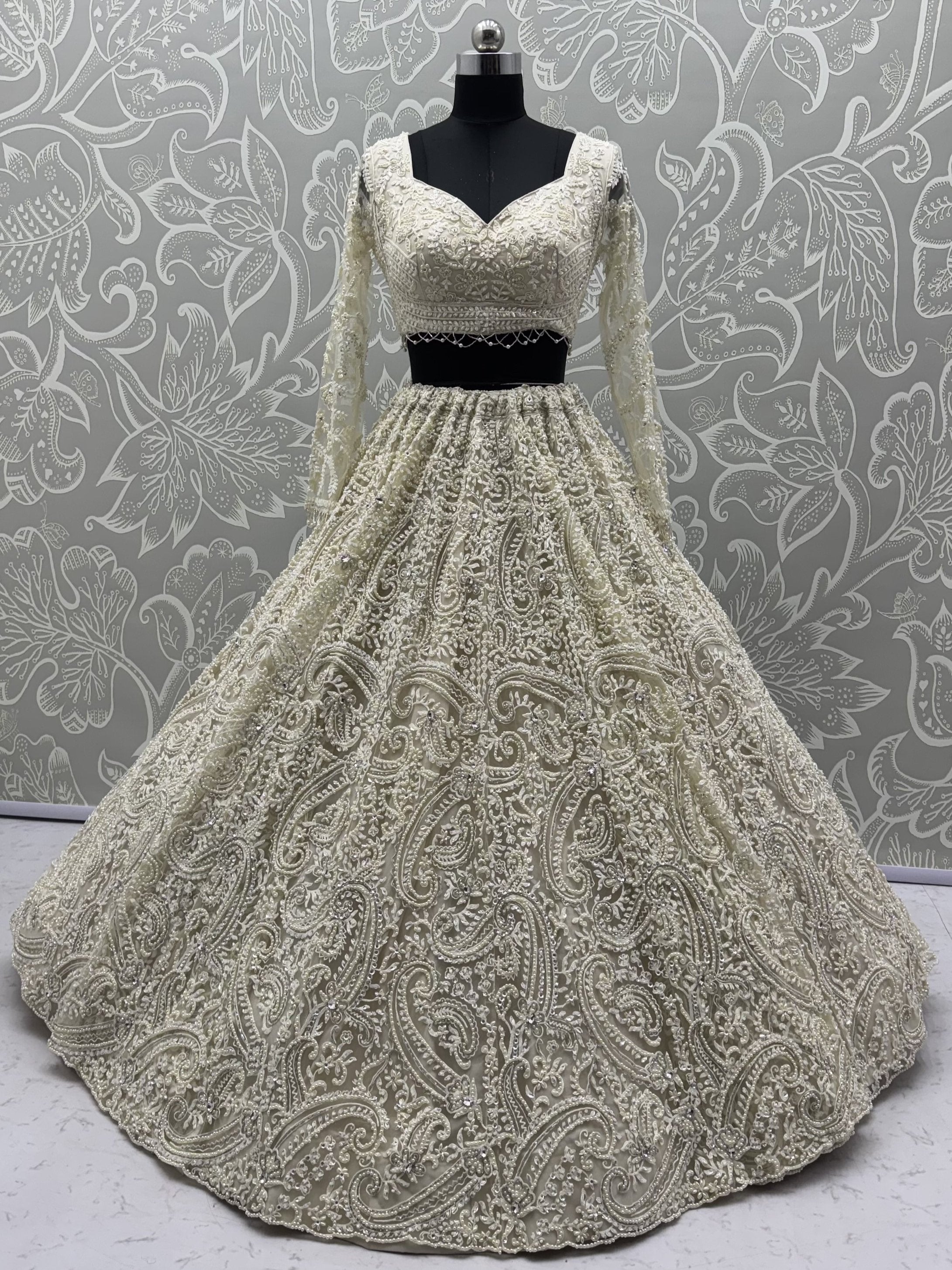 Monochrome White Hand Embroidered Net Wedding Wear Lehenga Choli