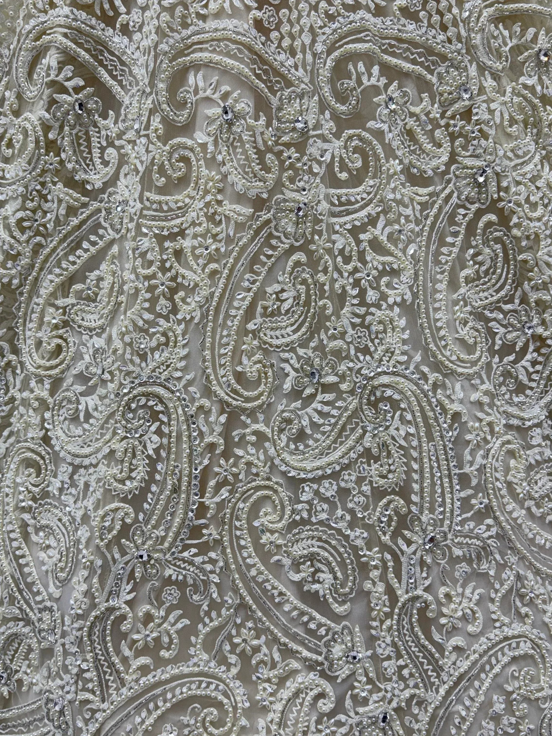 Monochrome White Hand Embroidered Net Wedding Wear Lehenga Choli