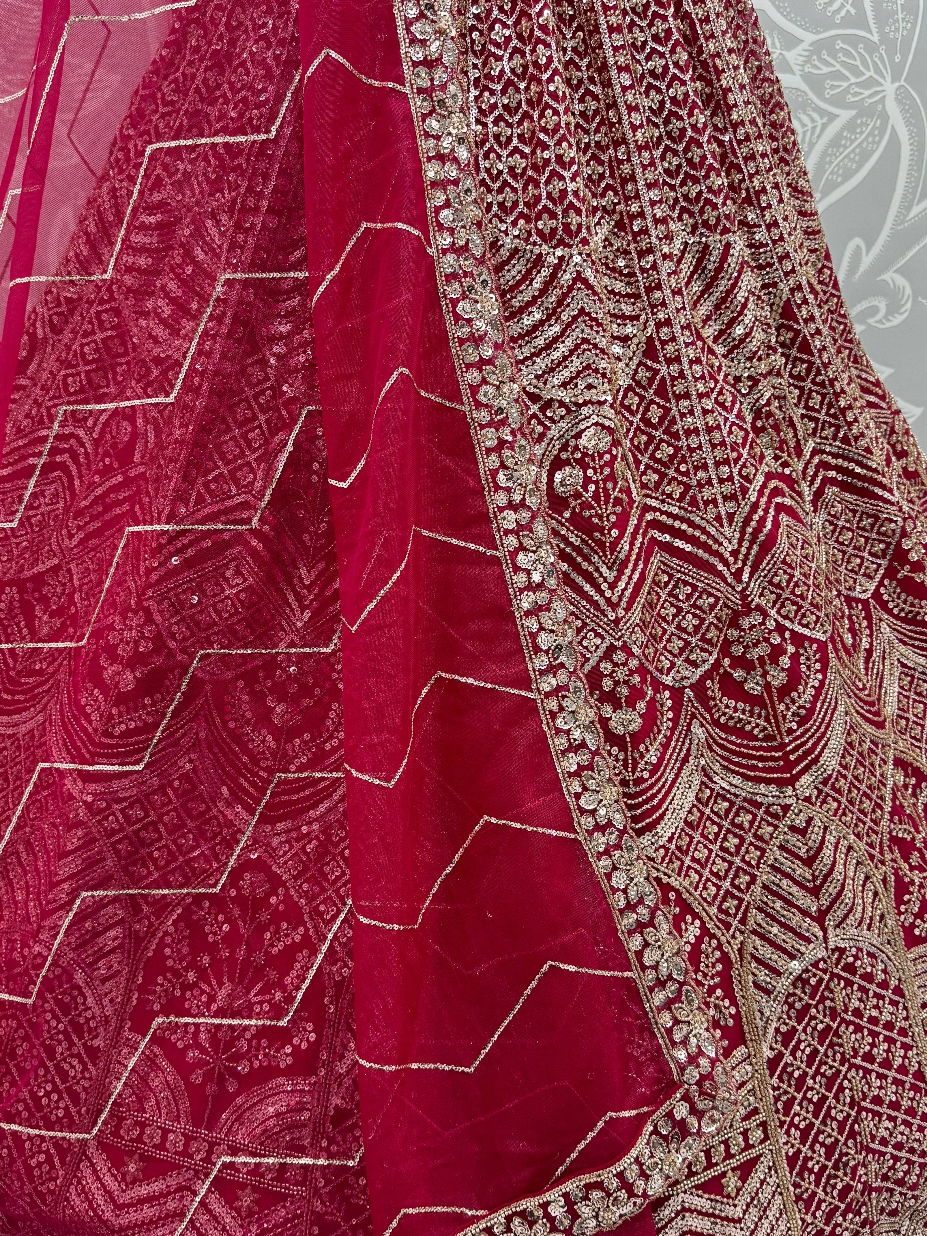 Impressive Pink Embroidered Net Bridal Lehenga Choli With Dupatta