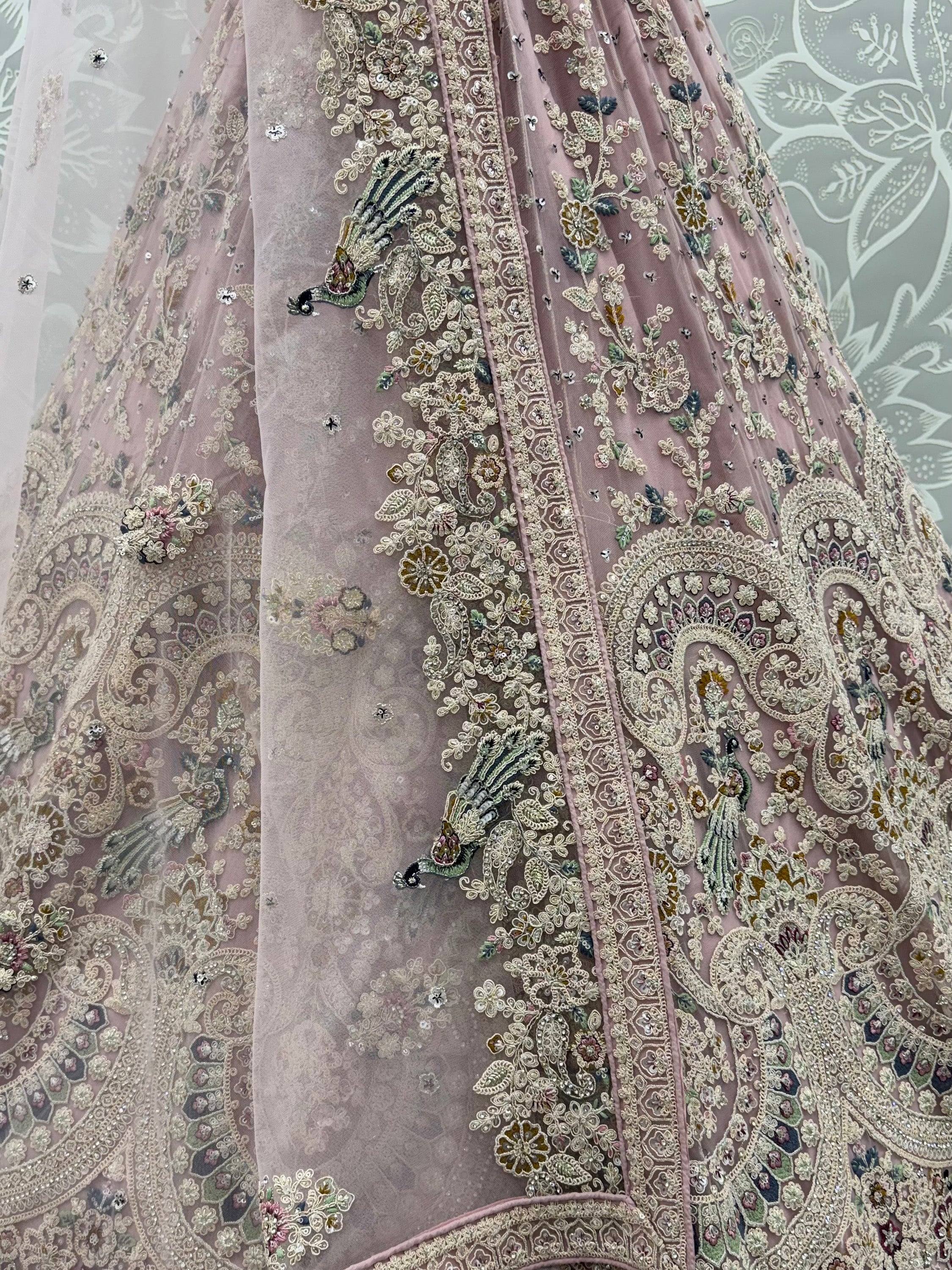 Lavish Dusty Pink Thread Embroidered Net Engagement Wear Lehenga Choli