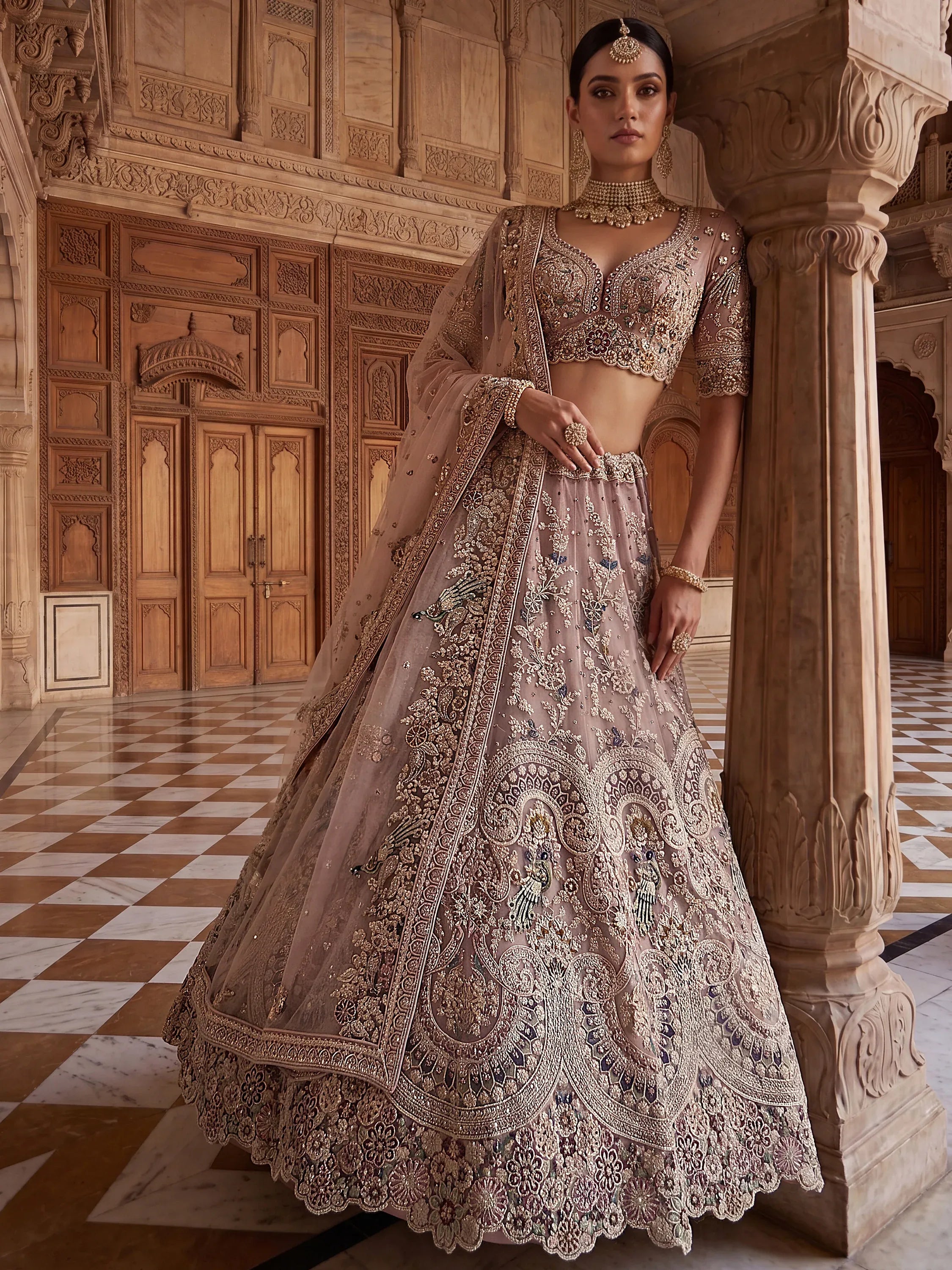 Lavish Dusty Pink Thread Embroidered Net Engagement Wear Lehenga Choli