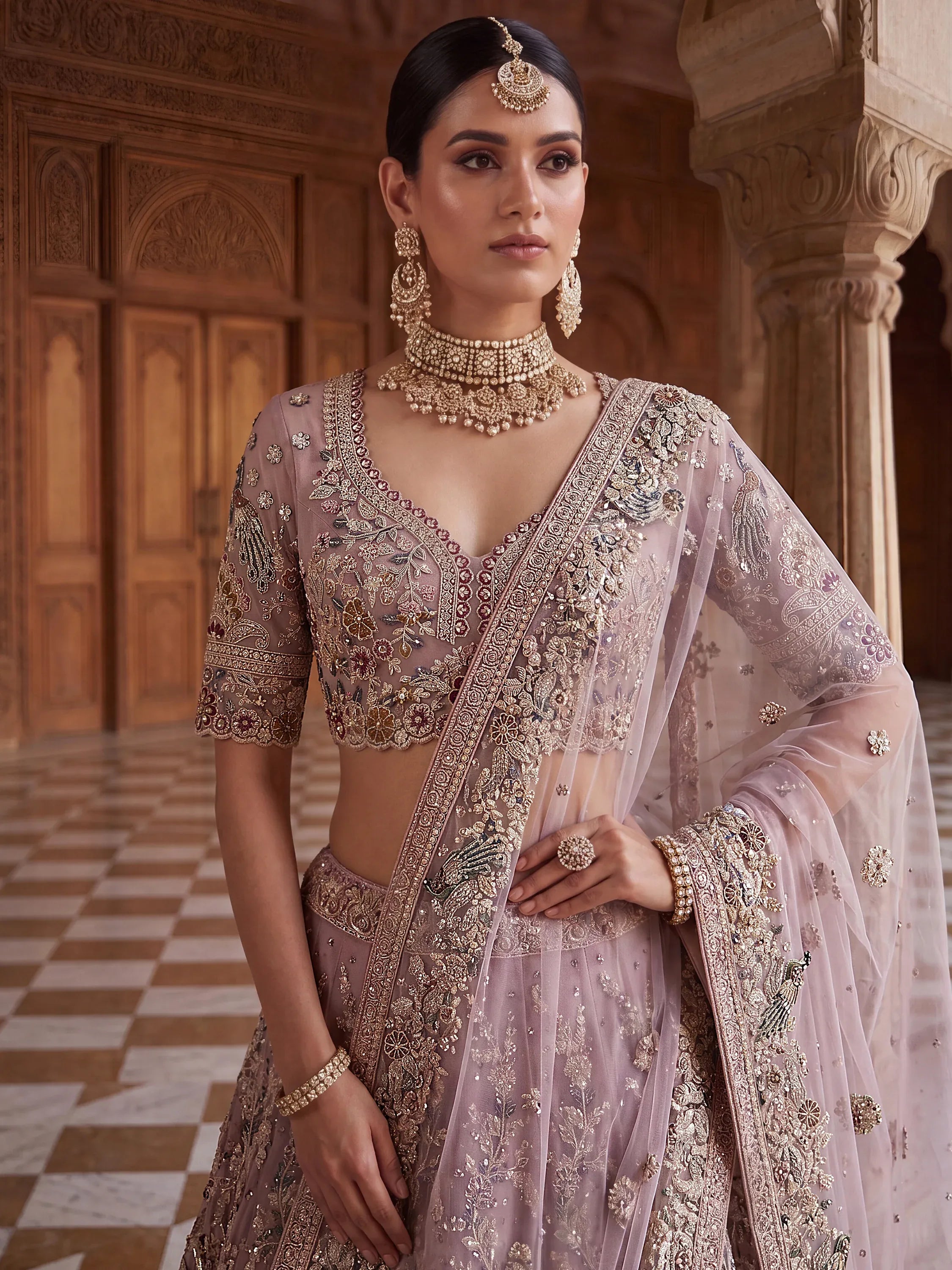 Lavish Dusty Pink Thread Embroidered Net Engagement Wear Lehenga Choli
