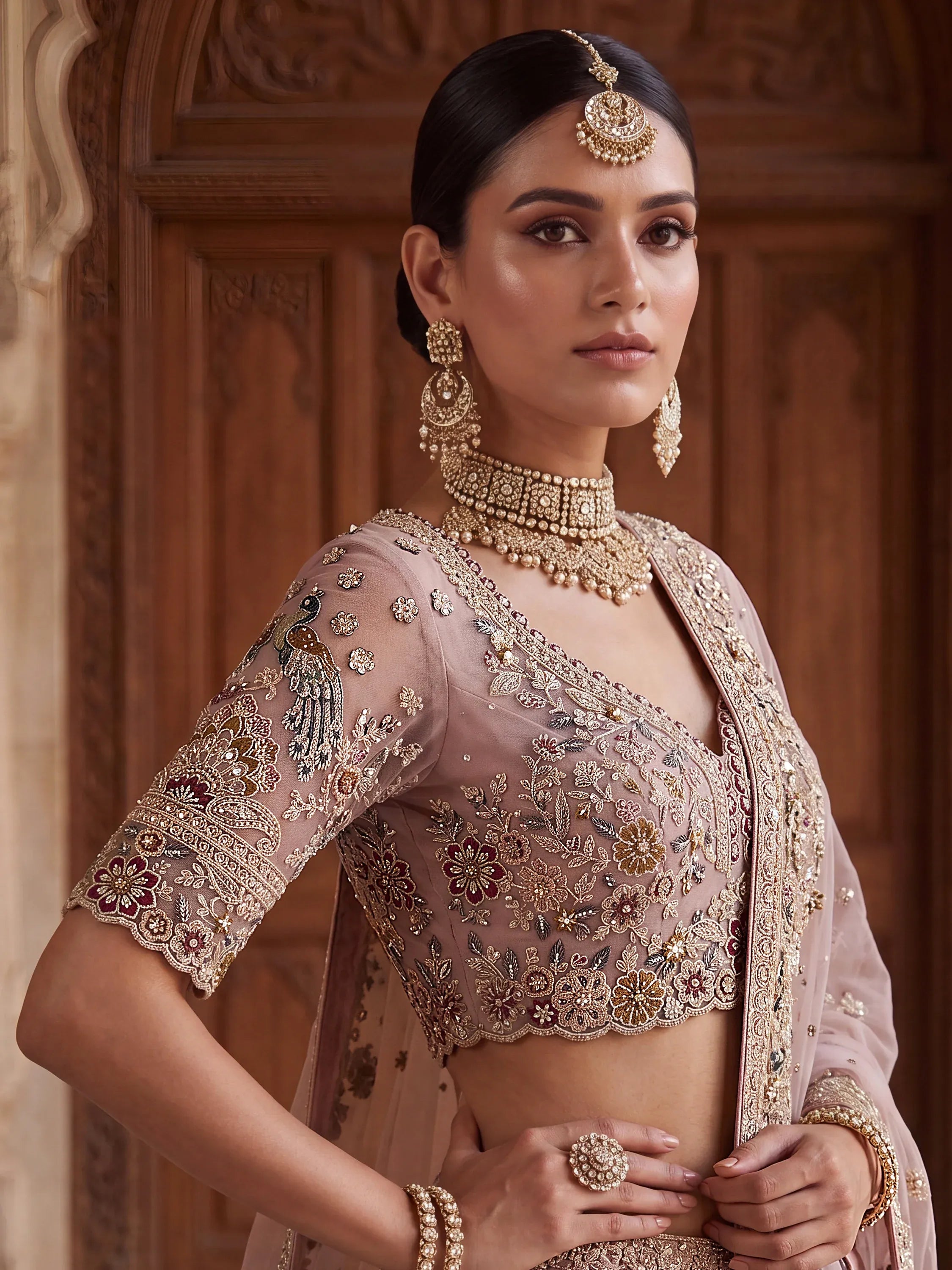 Lavish Dusty Pink Thread Embroidered Net Engagement Wear Lehenga Choli