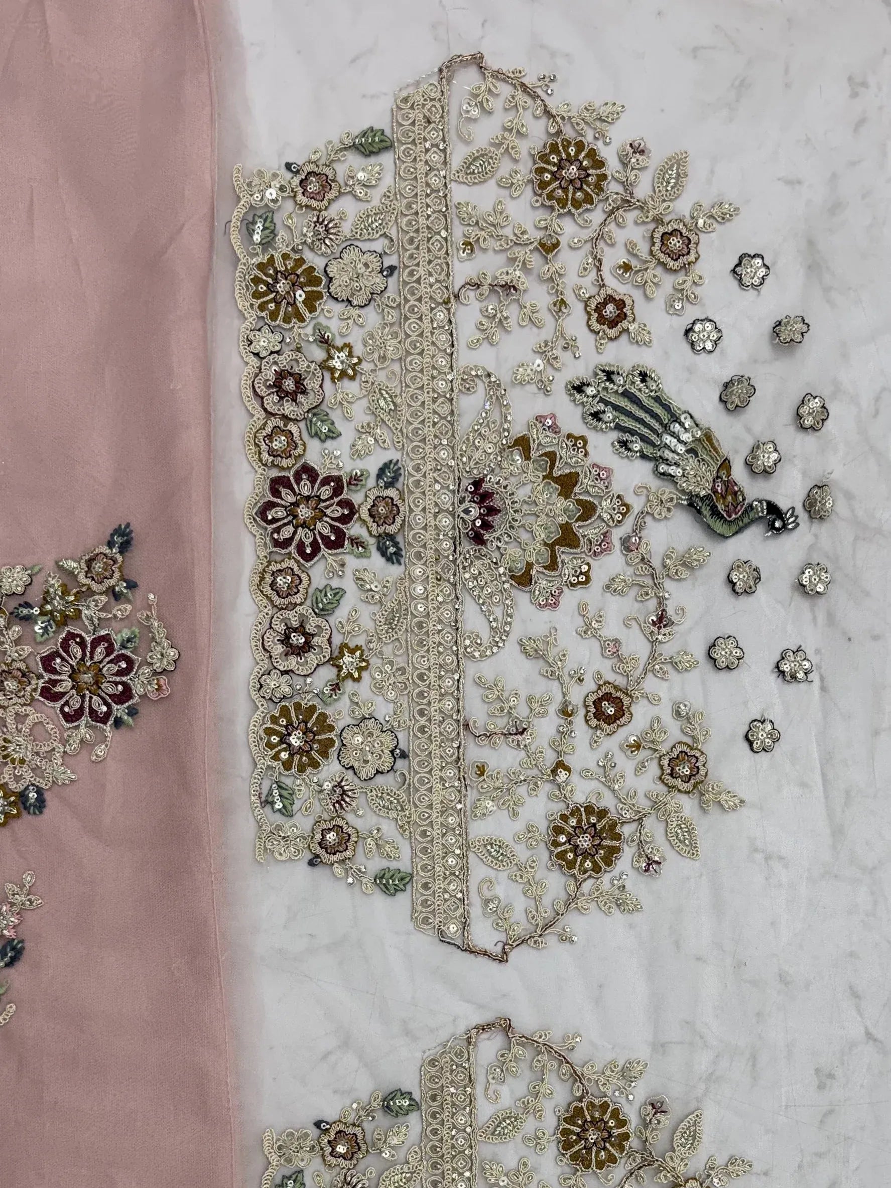 Lavish Dusty Pink Thread Embroidered Net Engagement Wear Lehenga Choli