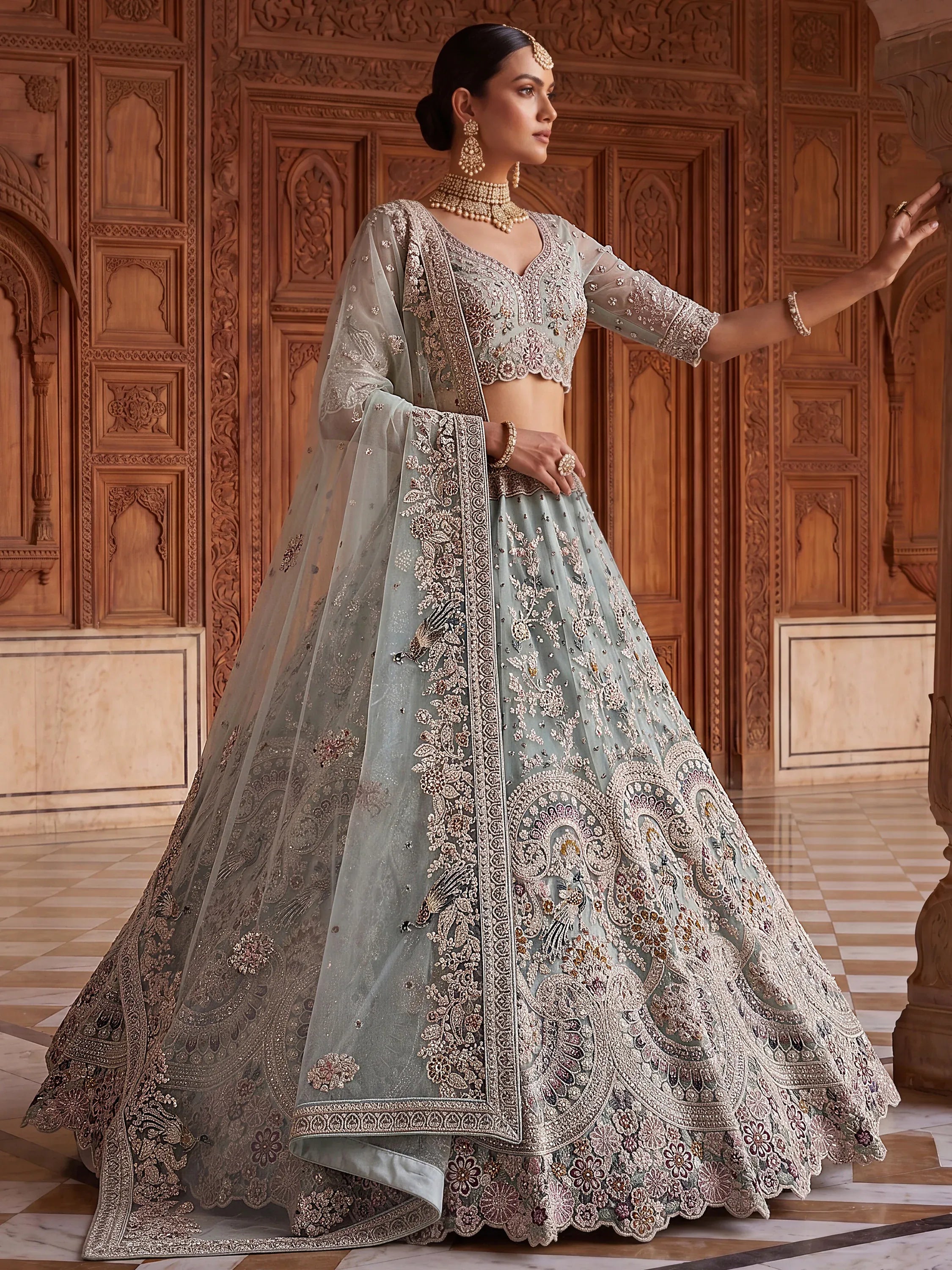 Tremendous Sky Blue Zari Work Net Wedding Wear Lehenga With Blouse