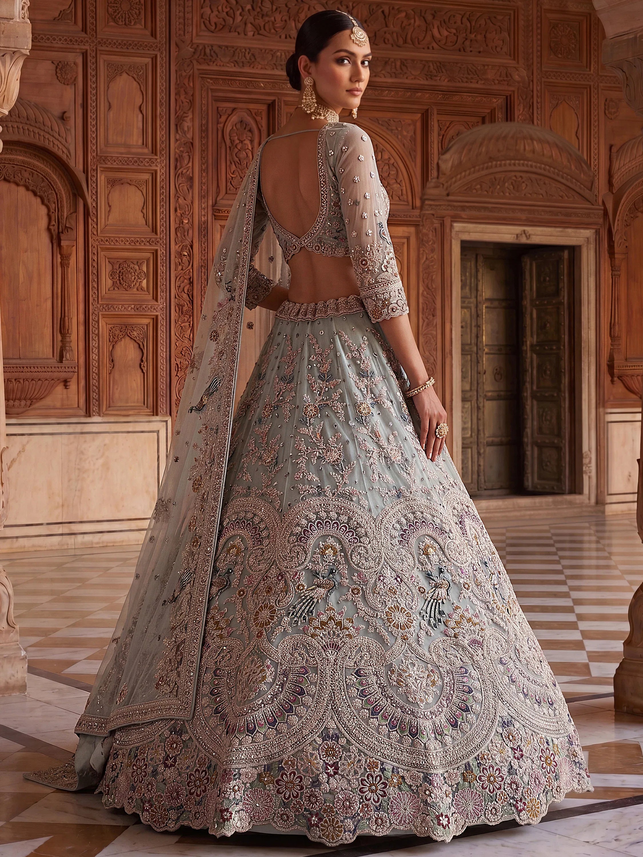 Tremendous Sky Blue Zari Work Net Wedding Wear Lehenga With Blouse
