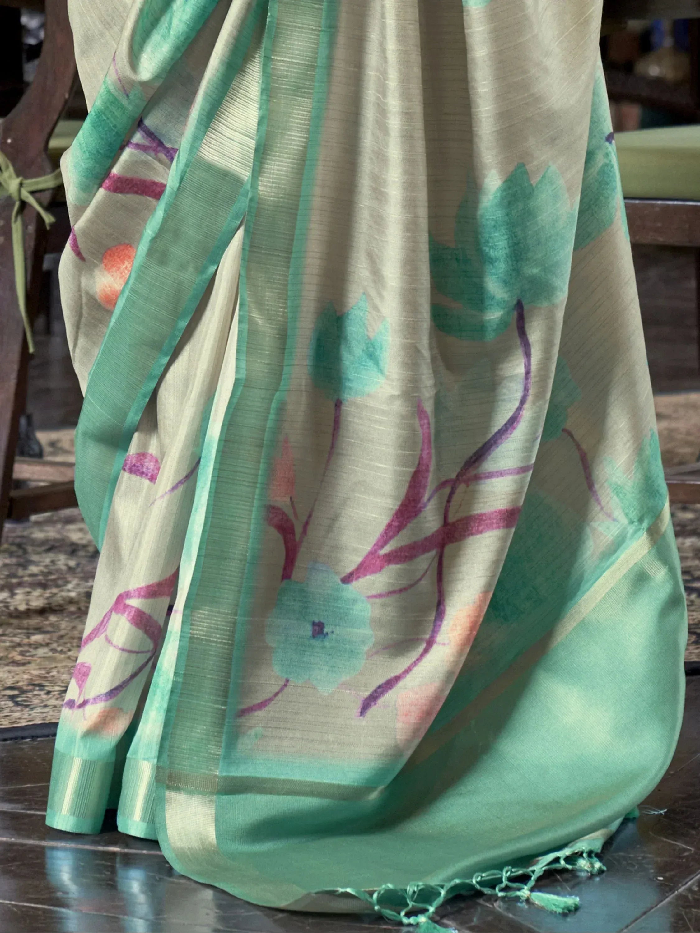 Elegant floral print saree in mint green and beige, perfect for Indian ethnic wear occasions.