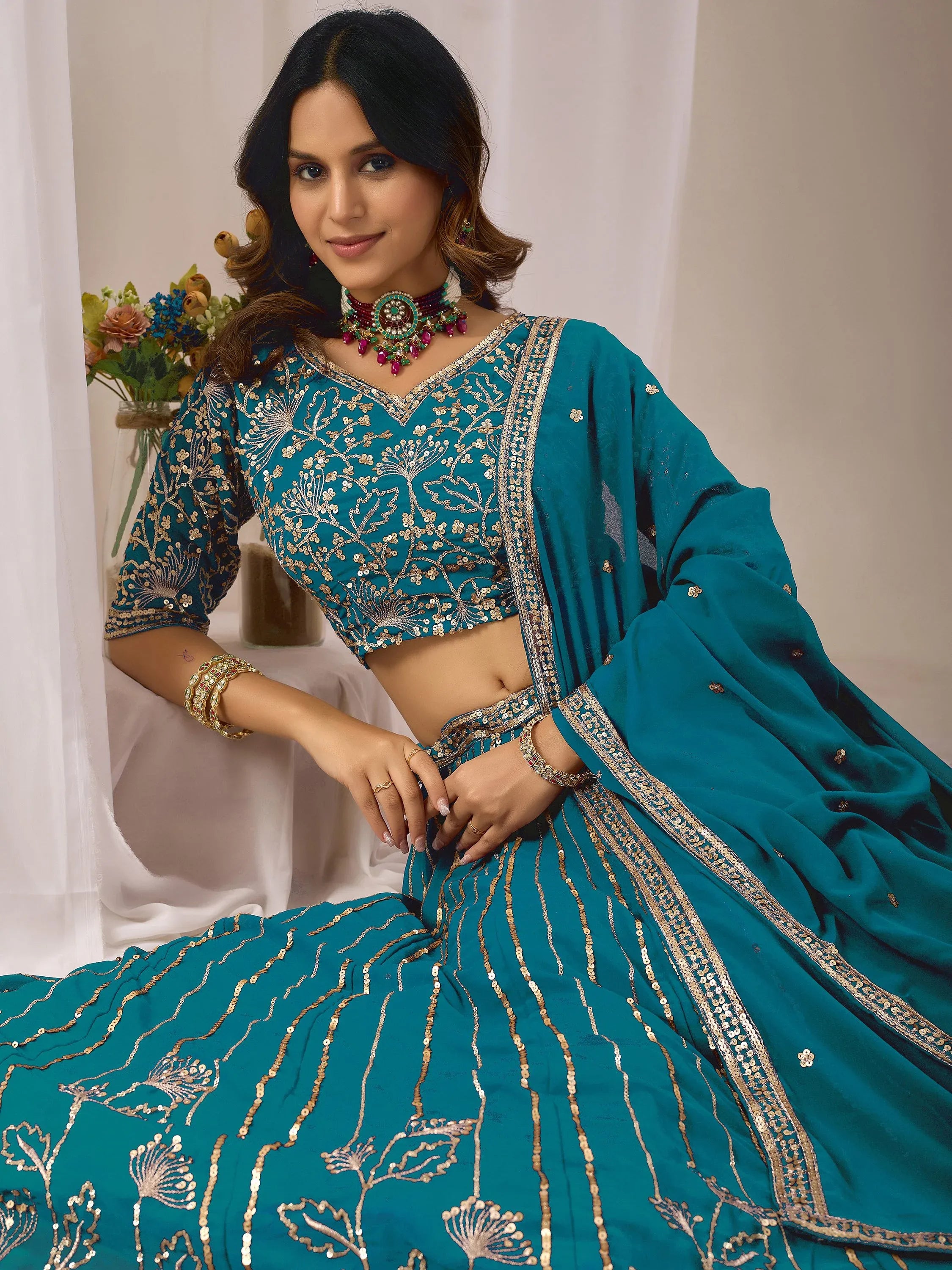 Amazing Teal Blue Embroidered Georgette Sangeet Wear Lehenga Choli