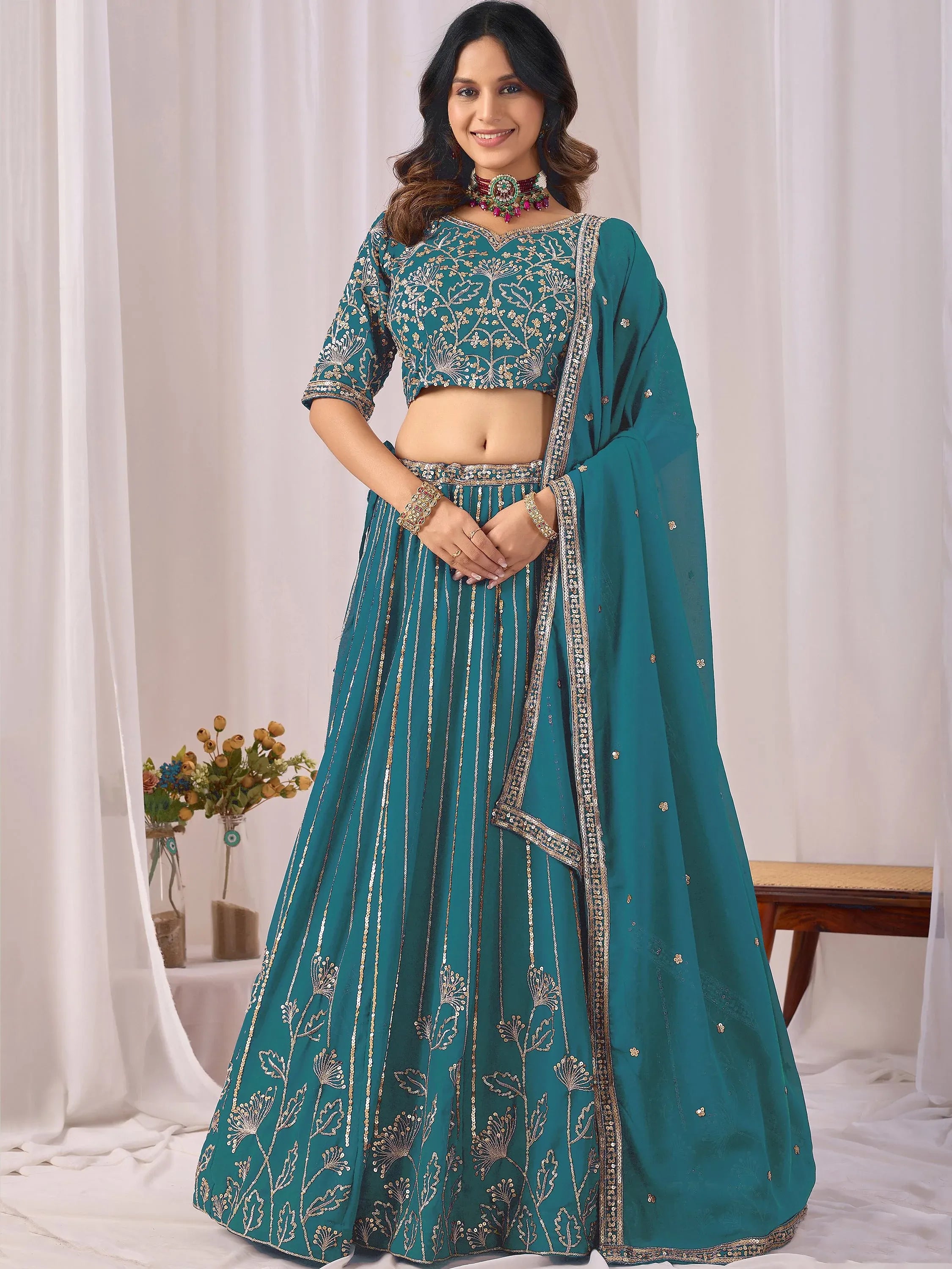 Amazing Teal Blue Embroidered Georgette Sangeet Wear Lehenga Choli